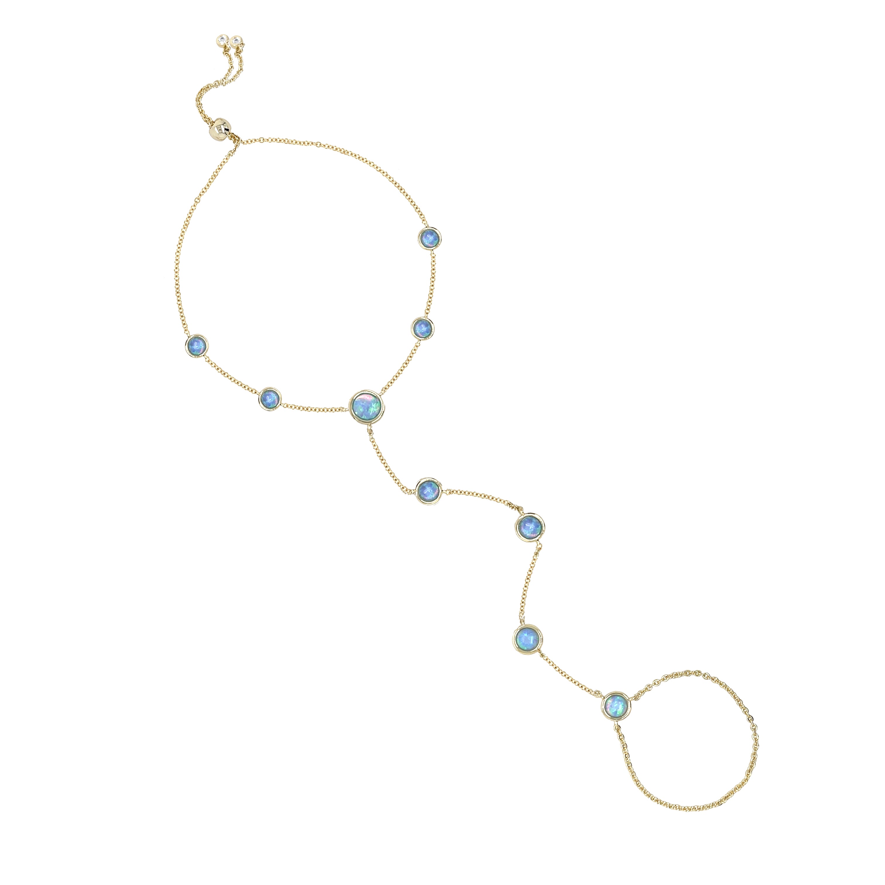 Blue Opal Adjustable Hand Chain
The ultimate "cool girl" accessory. Featuring high-quality simulated opals and a fine 18K gold-plated chain, it’s designed to drape elegantly over the hand for a look that is both edgy and sophisticated. Thanks to the adjustable slide clasp, you can find your perfect fit for all-day comfort. Wear it solo to let the opals pop, or pair it with your favorite gold rings for a maximalist moment.
18K Yellow Gold Plated
Simulated Blue Opal
Stone Size: 5MM & 6MM
Adjustable Slid
