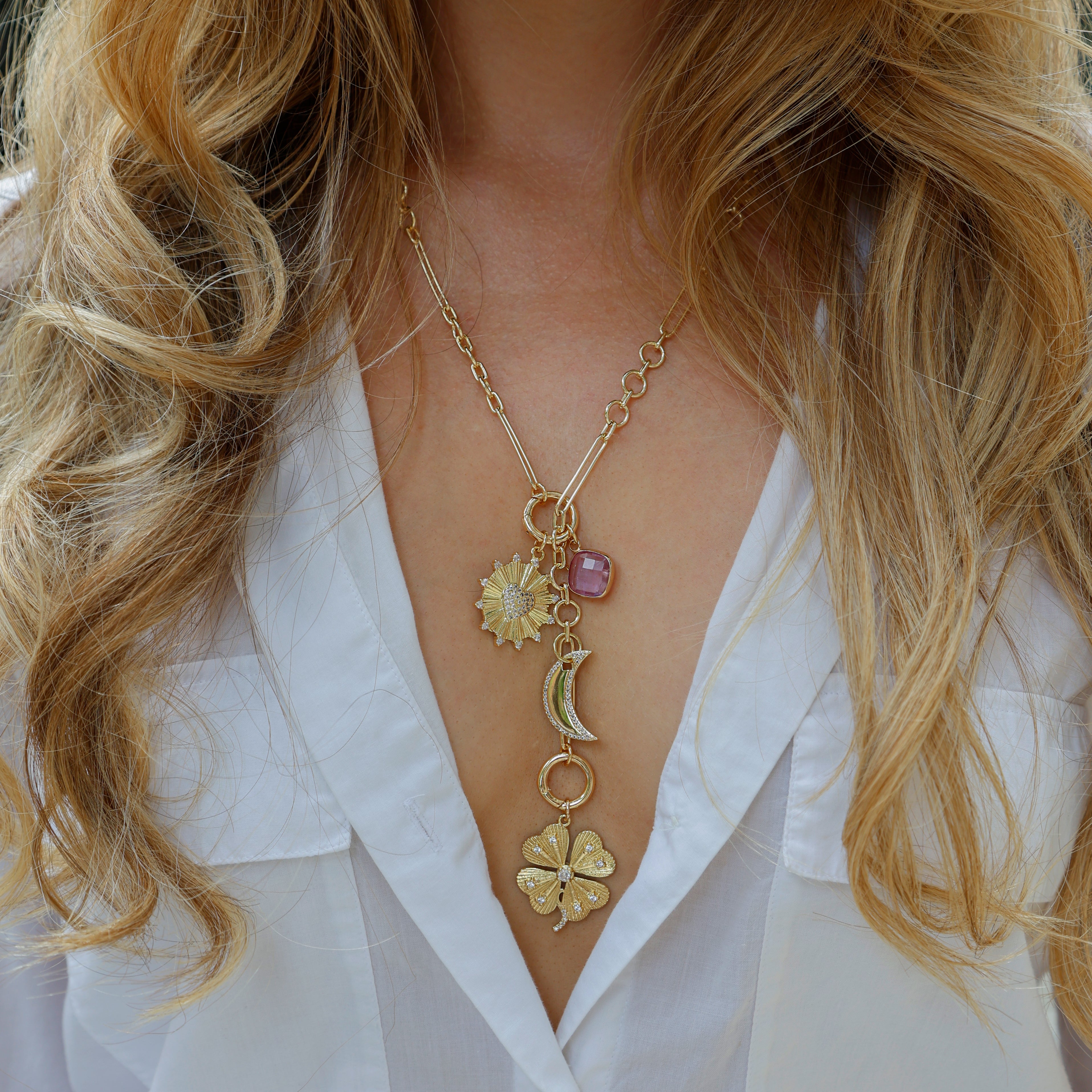 Introducing The Beverly Charm Necklace
Inspired by Jen’s mother, Beverly, a jeweler remembered for her love of charm necklaces and the stories they could hold. This limited-edition piece features four interchangeable charms representing awareness, hope, enduring love, and resilience.
This September, we are honored to partner with Maria Shriver and the Women’s Alzheimer’s Movement. Through this collaboration, two stories unite: Beverly’s legacy of meaningful jewelry and Maria’s dedication to ending Alzheim