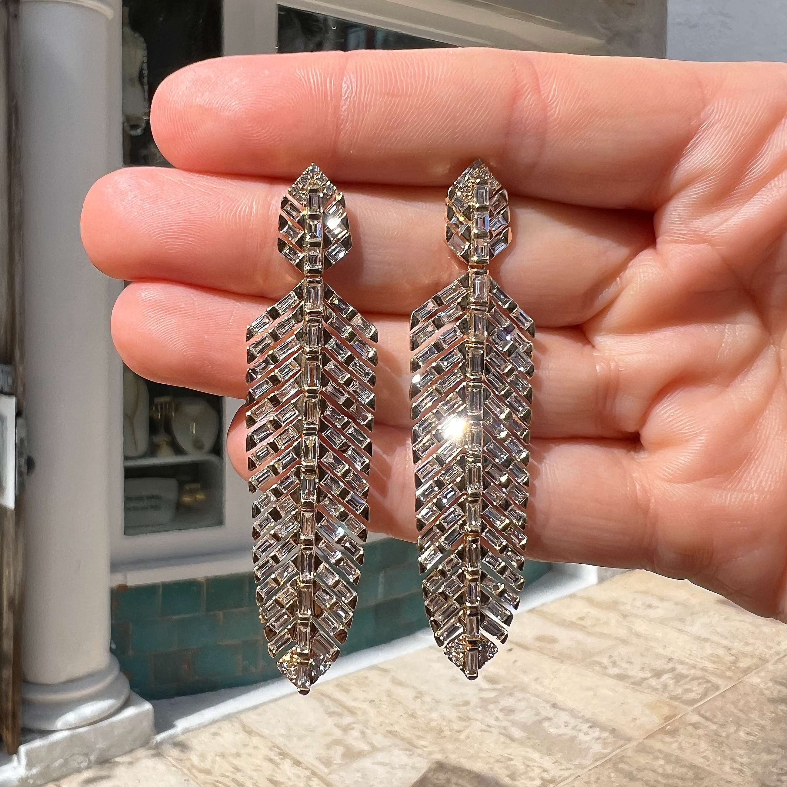 Baguette Diamond Feather Pierced Earrings
Introducing our Diamond Feather Earrings! Adorned with baguette diamonds, these earrings are more than just a fashion statement - they're a unique, art deco inspired accessory. Add a touch of elegance and personality to any outfit with these stunning feather-shaped earrings.
14K Yellow Gold
6.30 Diamond Carat Weight
2.45" Long X 0.61" Wide
