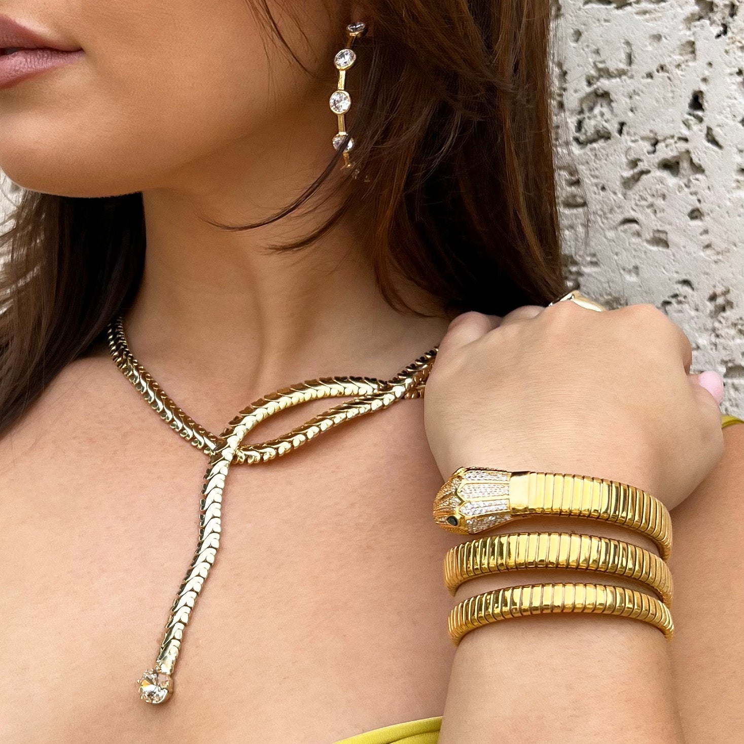 Pave Snake Green Eyes Twist Flex Bracelet Yellow Gold Plated Circular Shape: 1.6” Diameter 1.20-1.57” Width Slightly Flexible