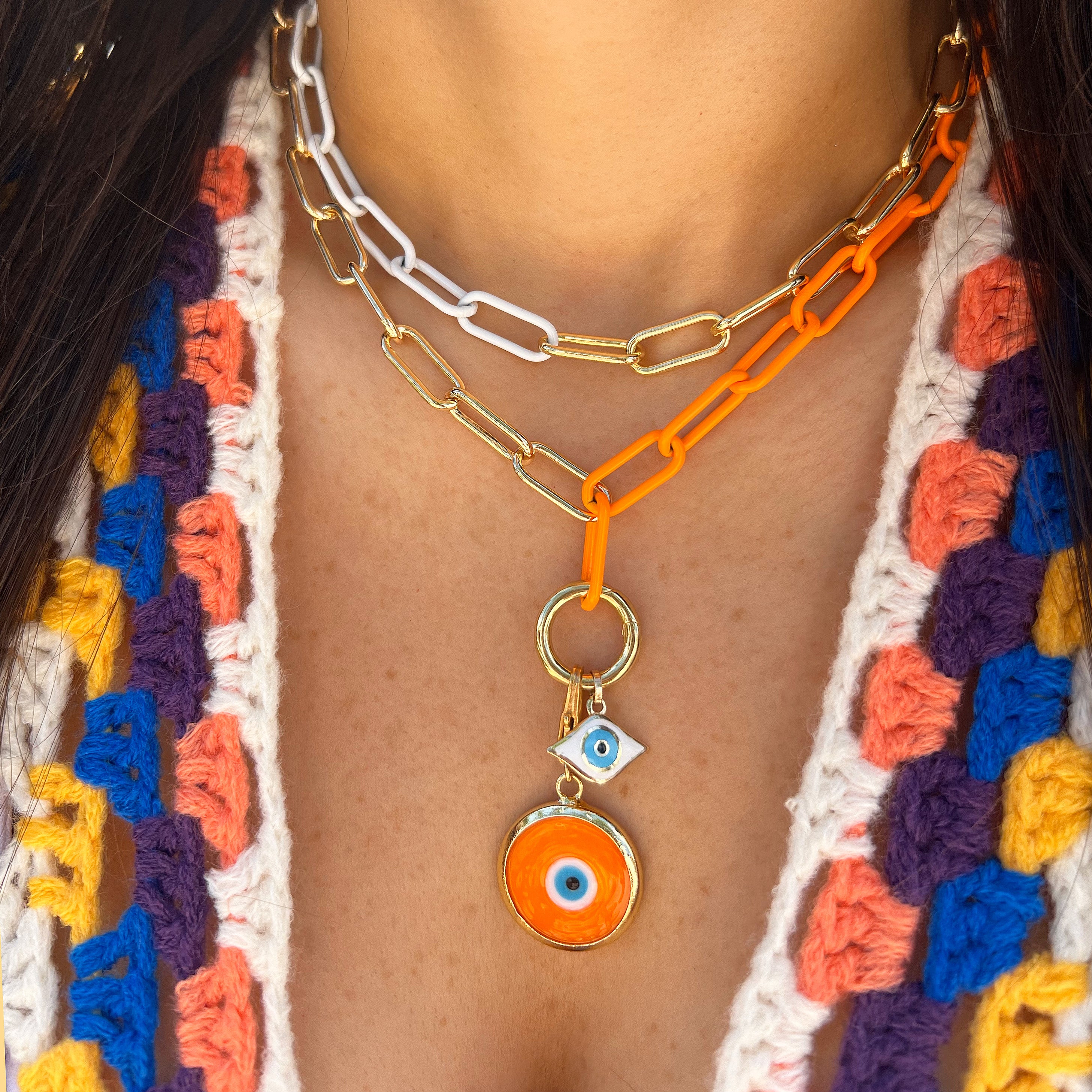 <p>Orange Evil Eye Charm </p> <ul> <li>Yellow Gold Plated</li> <li>0.84" Diameter</li> </ul>