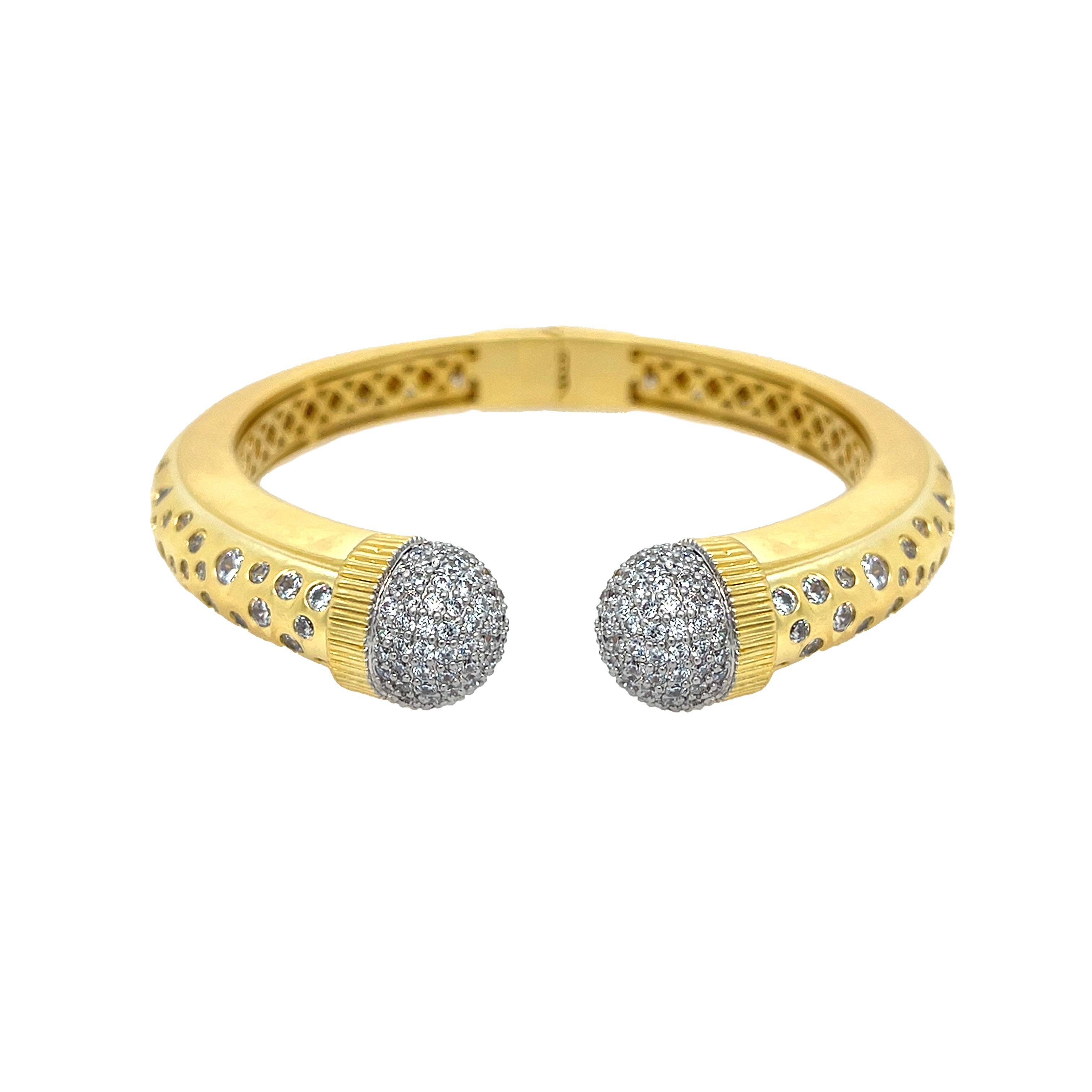 CZ Pave Round Tips Hinge Bangle Bracelet
This elegant Hinge Bangle Bracelet features a sleek and stylish design, perfect for adding a touch of sophistication to any outfit. Featuring sparkling pave cubic zirconias, this bracelet provides an edgy and modern look. Its unique hinged closure ensures a secure fit, making it a must-have bangle.
Yellow & White Gold Plating
0.48" Wide