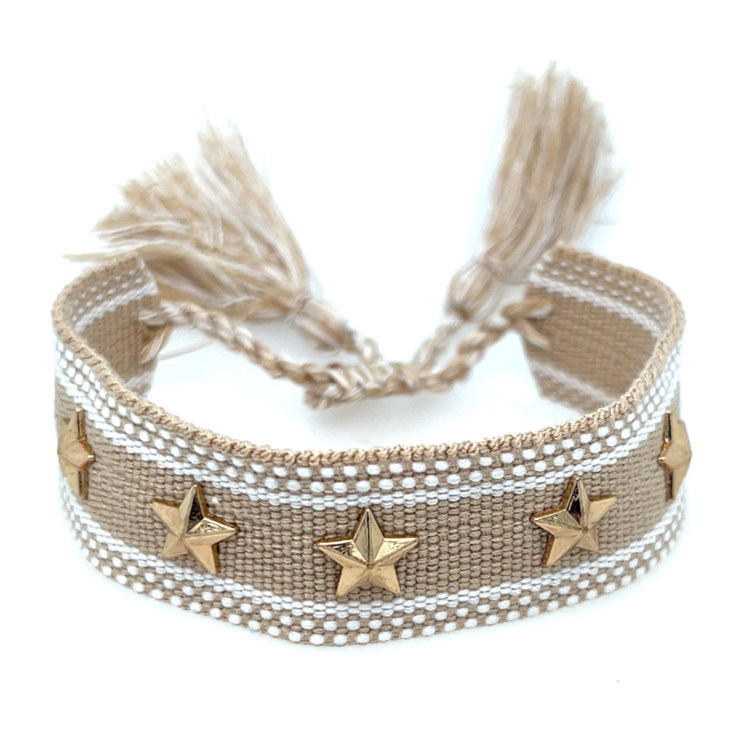Beige bracelet with star charms and tassels on a white background