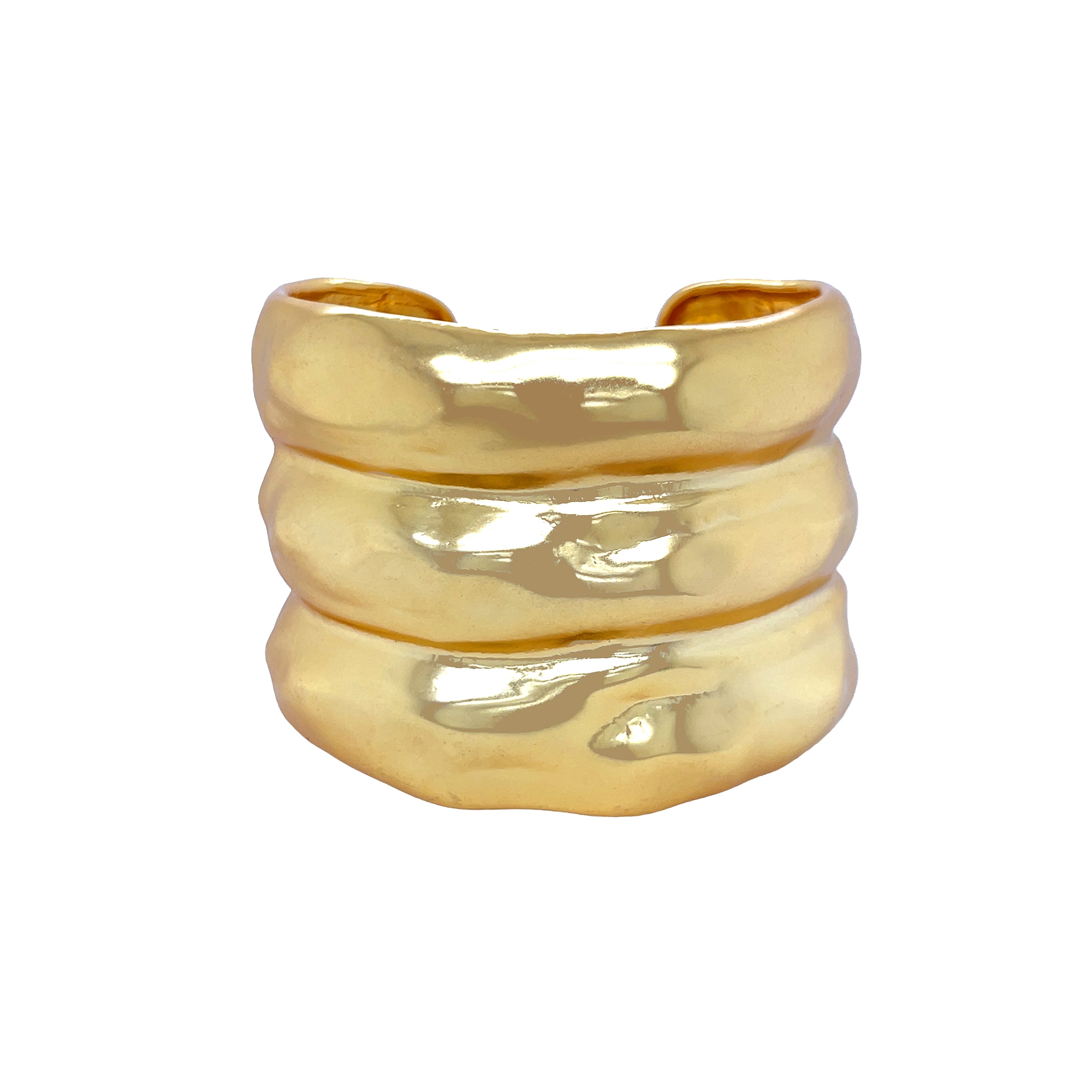 Three-Row Sculpted Bubble Cuff Bracelet
An elevated statement cuff designed for maximum impact. Finished in a polished yellow gold plating, this open cuff features three sculpted rows with an organic, fluid shape that catches the light from every angle. Bold yet wearable, this piece anchors any look and pairs beautifully with both minimalist and statement jewelry.
Yellow Gold Plated
1.95" Long