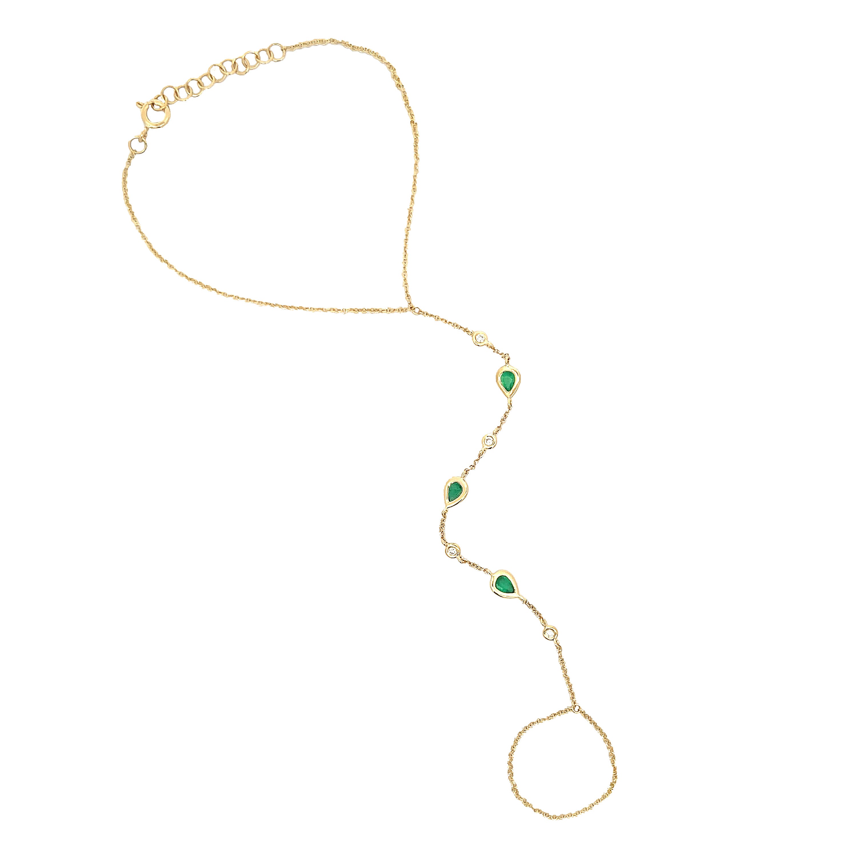 <p>Diamond & Emerald Hand Chain Bracelet</p> <ul> <li>14K Yellow Gold</li> <li>5.75-6.75" Adjustable Bracelet Length</li> <li>0.08 Diamond Carat Weight</li> <li>0.43 Emerald Carat Weight</li> </ul>