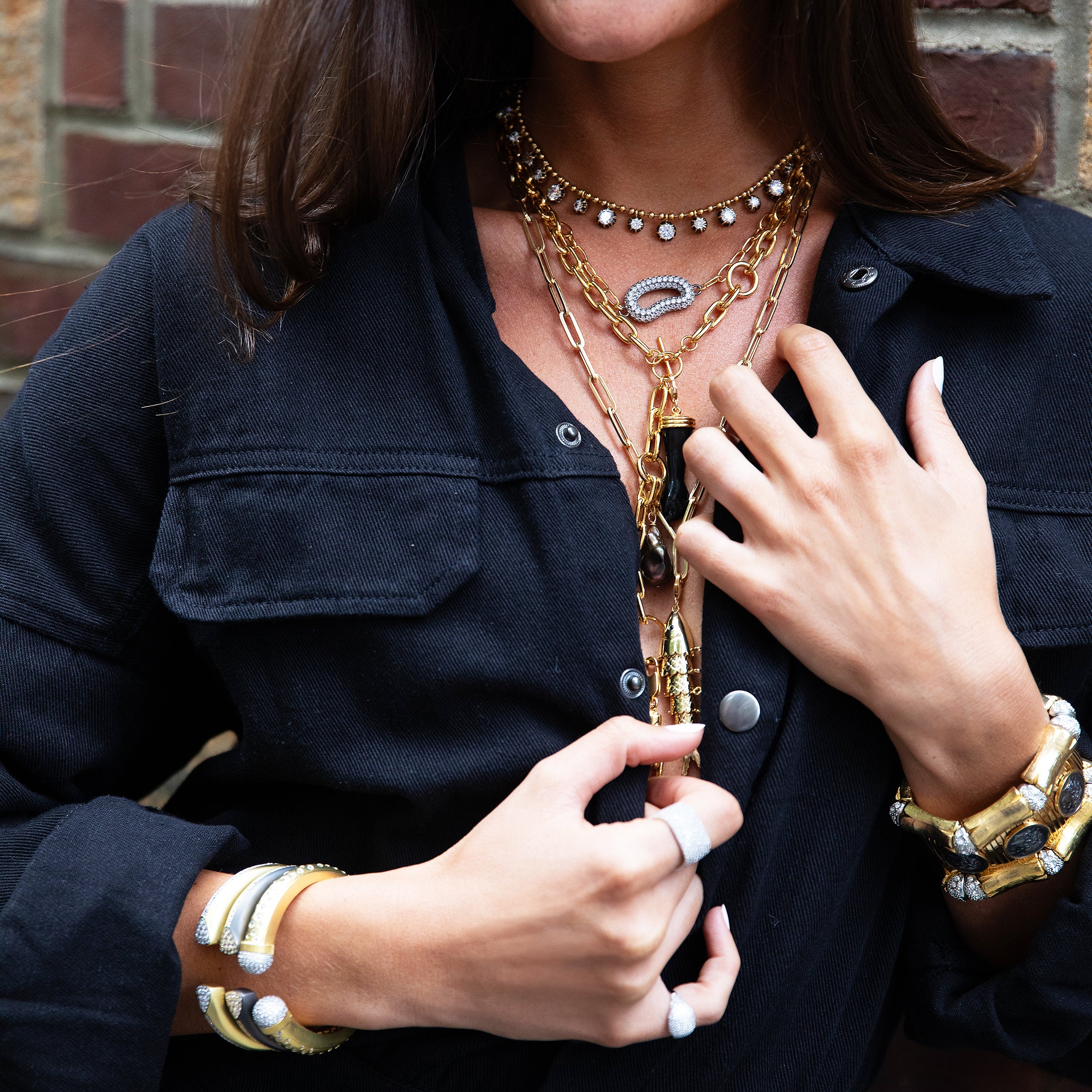 CZ Open Bean Chain Link Necklace
The Open Bean Necklace features an organic shape with a subtle sparkle, elegantly connected by a delicate link design. This refined piece adds a touch of natural beauty and sophistication to any outfit.
Yellow Gold & Oxidized Plating
CZ Bean: 0.65" Long X 1.05" Wide
18" Length