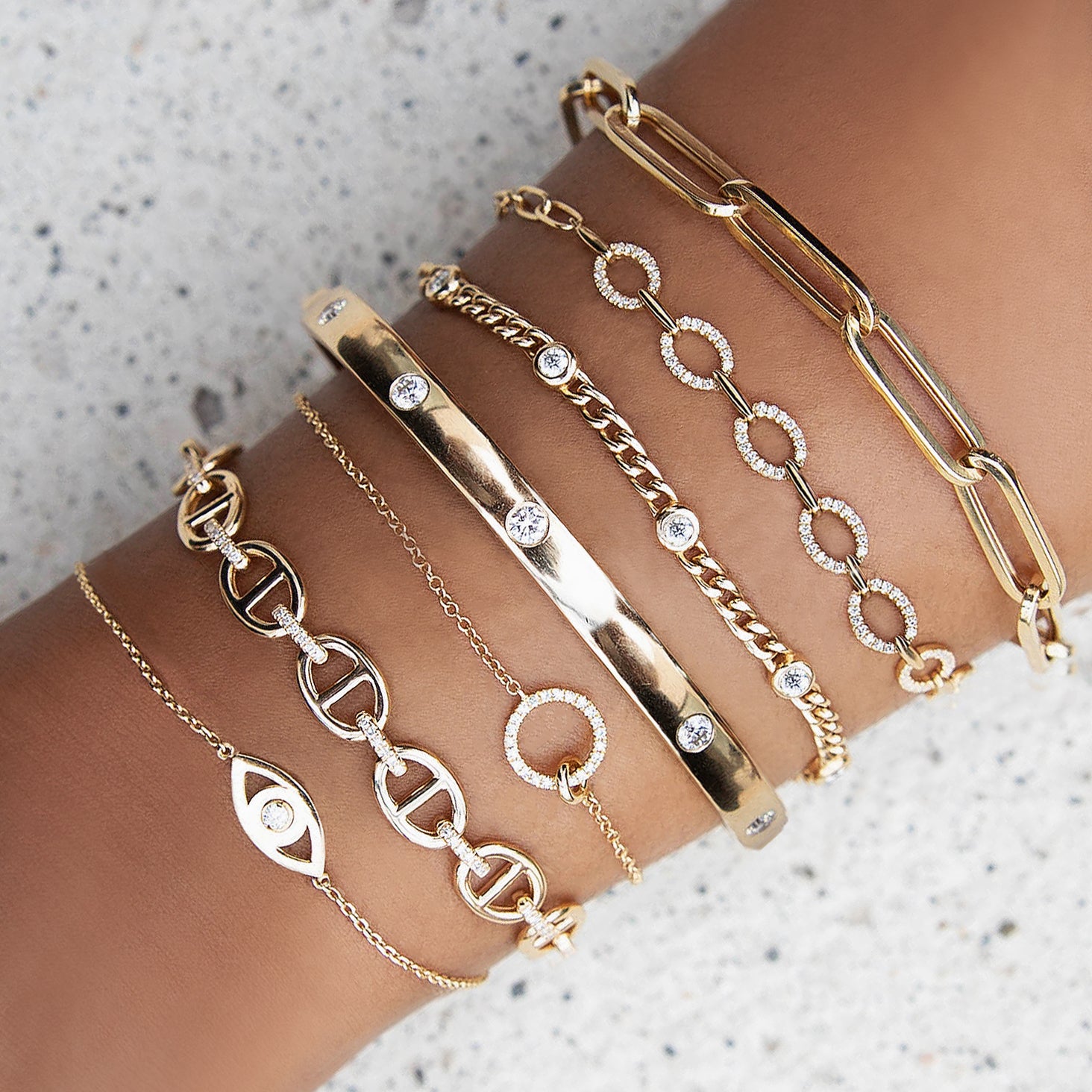 Pave Diamond Oval Link Bracelet on Paperclip Chain 14K Yellow Gold 6.75" Chain Length 0.22 Diamond Carat Weight Diamond Links: 0.20” High X 0.24" Wide