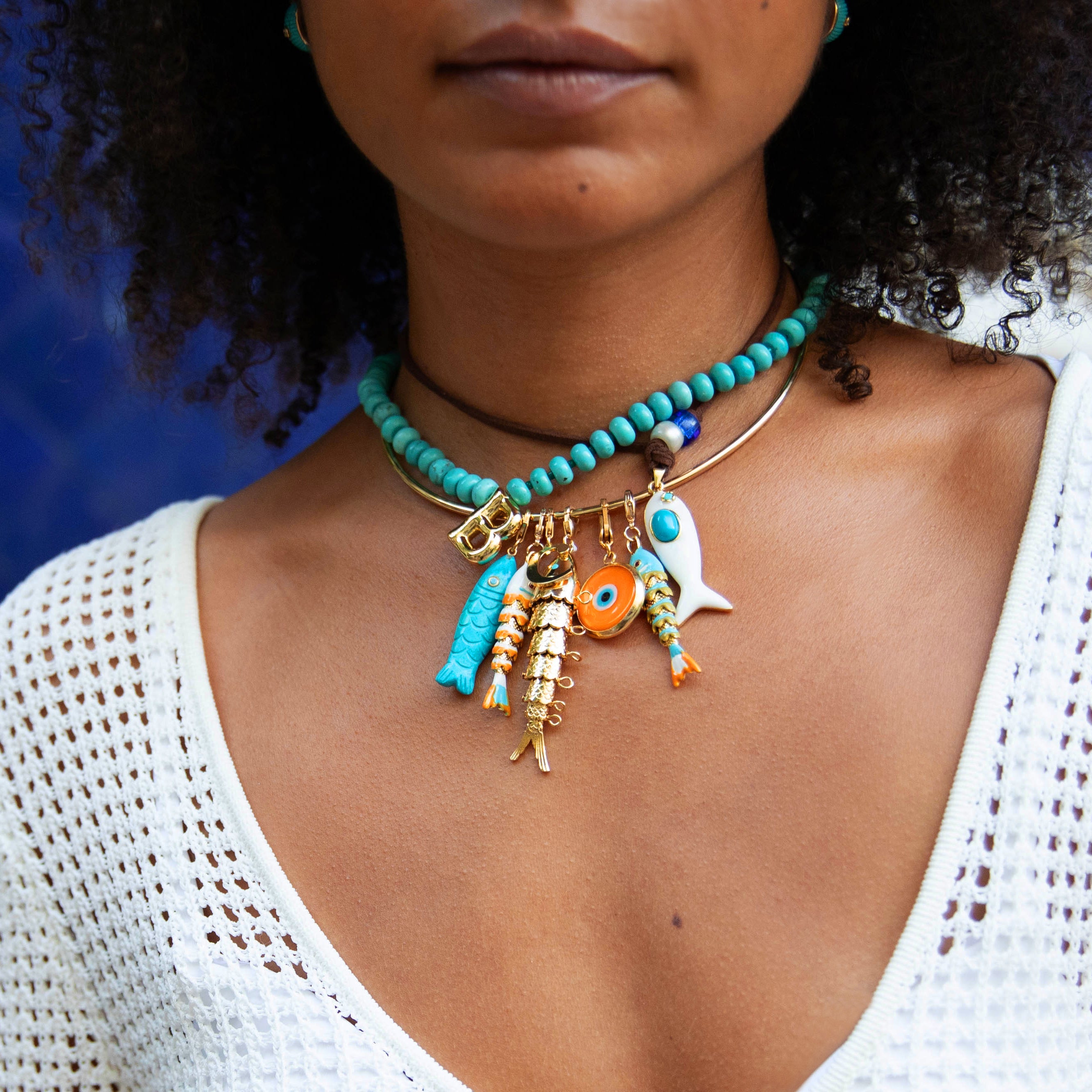 Large Textured Flex Turquoise Eye Fish Charm
Reel in some fun with our Flex Fish Charm! This flexible and texturized charm adds a playful touch to any accessory. No need to fish for compliments, they'll come swimming your way with this cute addition.
Yellow Gold Plated
2.5" Long x 0.66" Wide