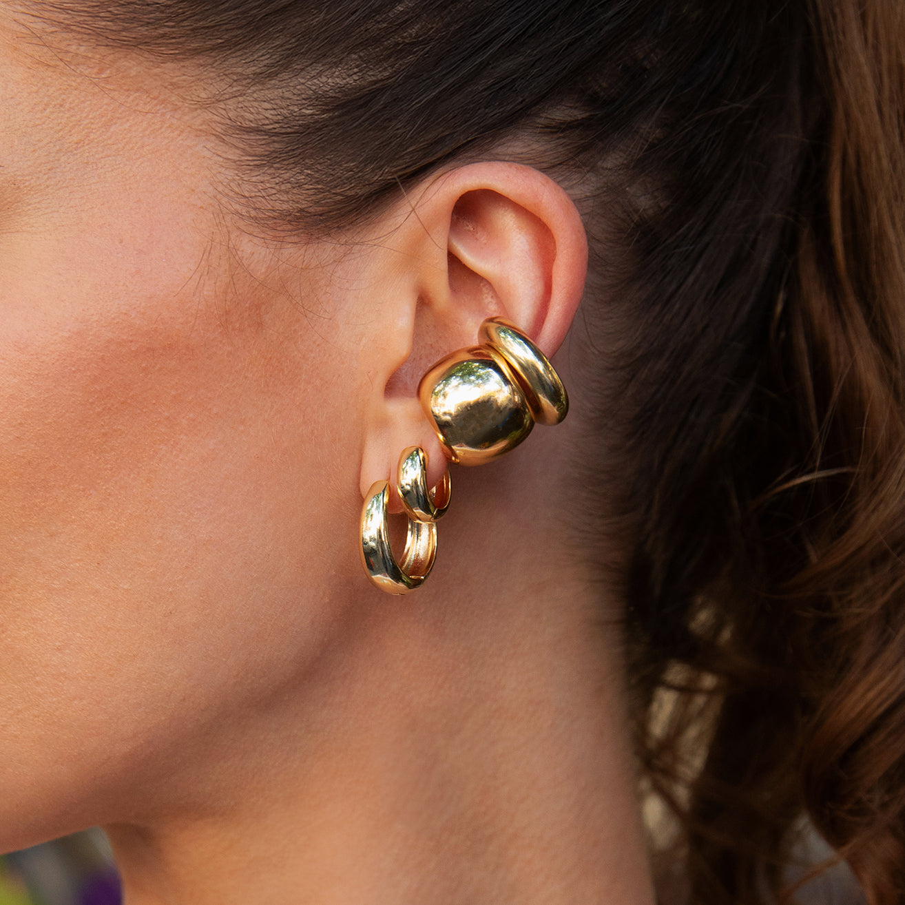 Wide Ear Cuff Earring
Elevate your ear stack with this Wide Cuff Earring, designed to add bold sophistication without the need for piercings. Its chunky silhouette creates a striking statement, perfect for layering or wearing alone to enhance your look with modern elegance. Crafted for comfort and style, this ear cuff seamlessly blends contemporary design with timeless appeal.
Yellow Gold Plated
0.64" Wide