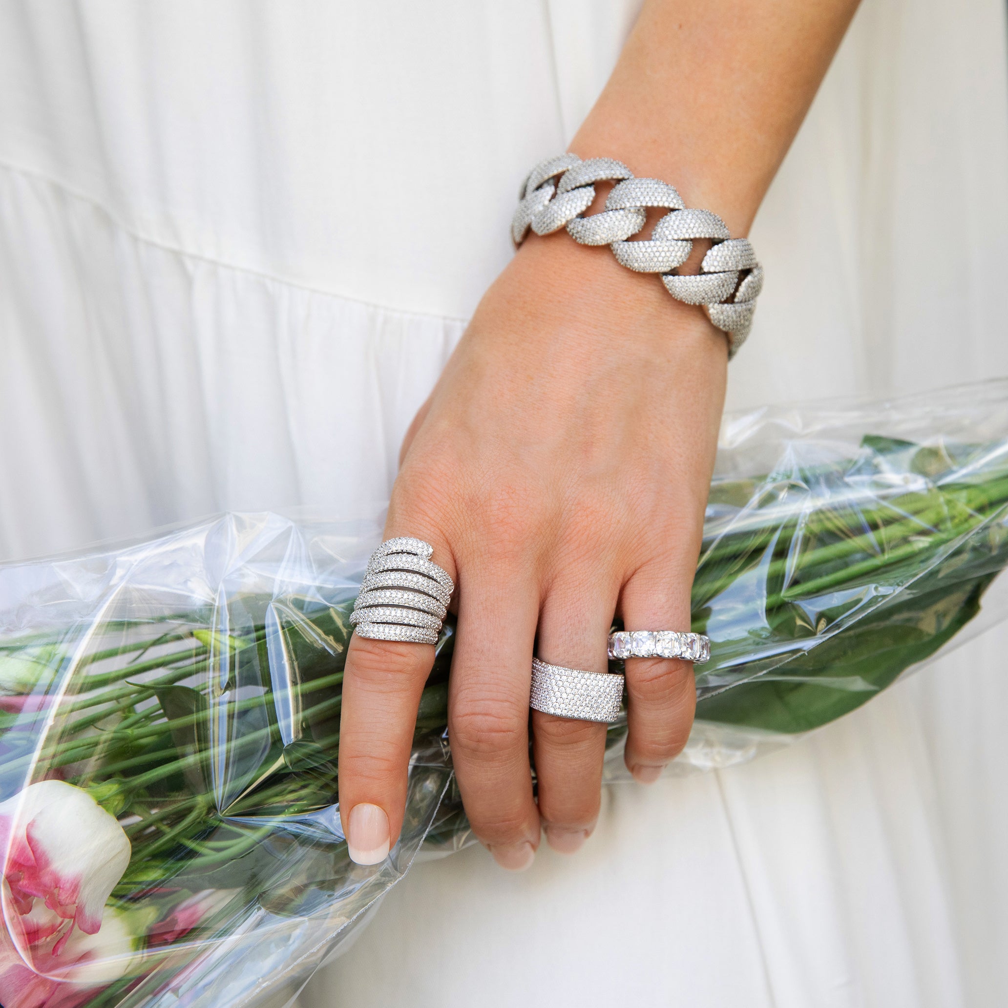 CZ Square Eternity Ring
Indulge in luxury with our Square Eternity Ring. Crafted with white gold plating and adorned with sparkling pavé cubic zirconia, this ring adds a touch of elegance to any outfit. Elevate your style with this sophisticated and unique piece.
White Gold Plated
Pave Cubic Zirconia
0.45" Wide