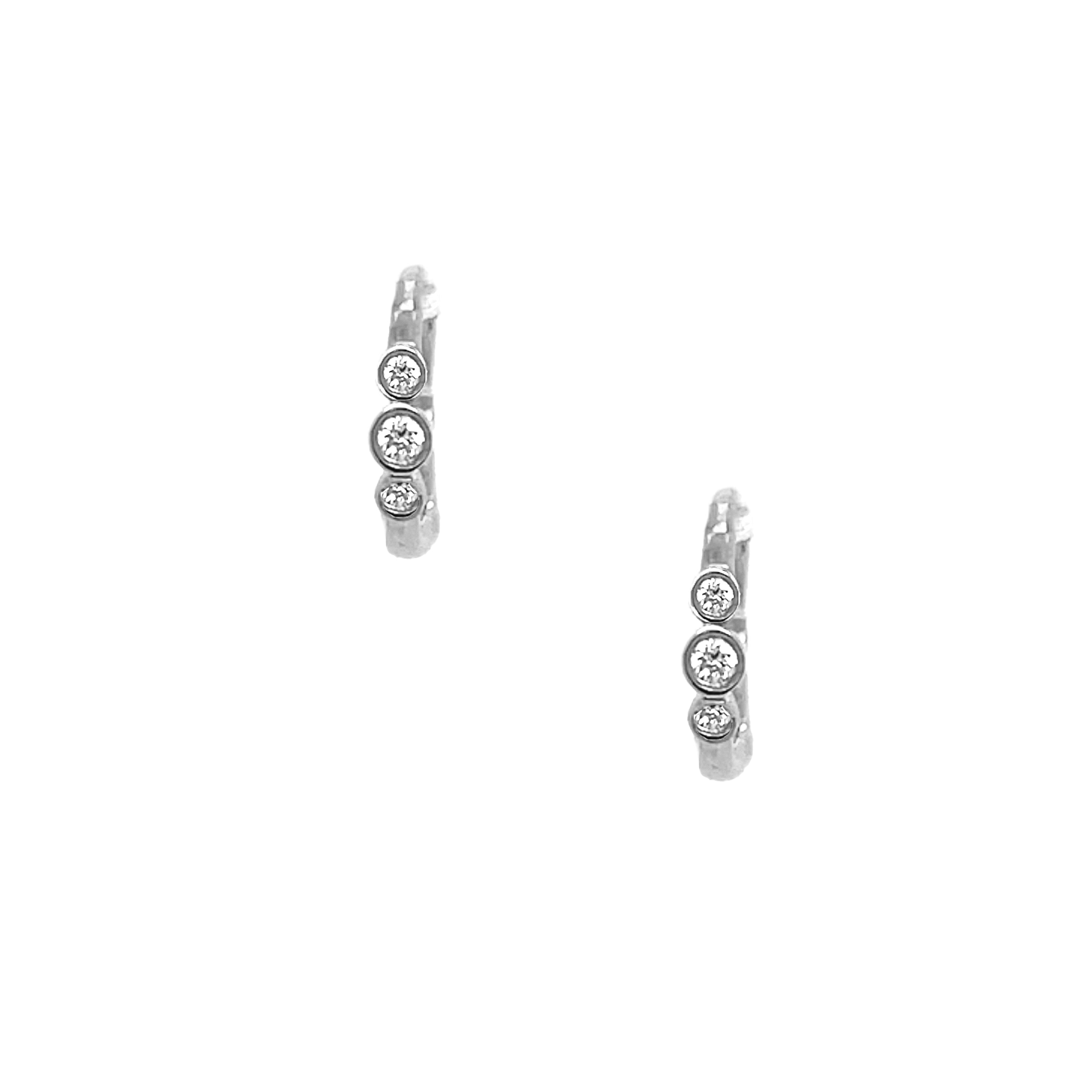 Diamond 3 Bezel Huggie Pierced Earrings
14K White Gold
0.08 Diamond Carat Weight
0.42" Long X 0.09" Wide