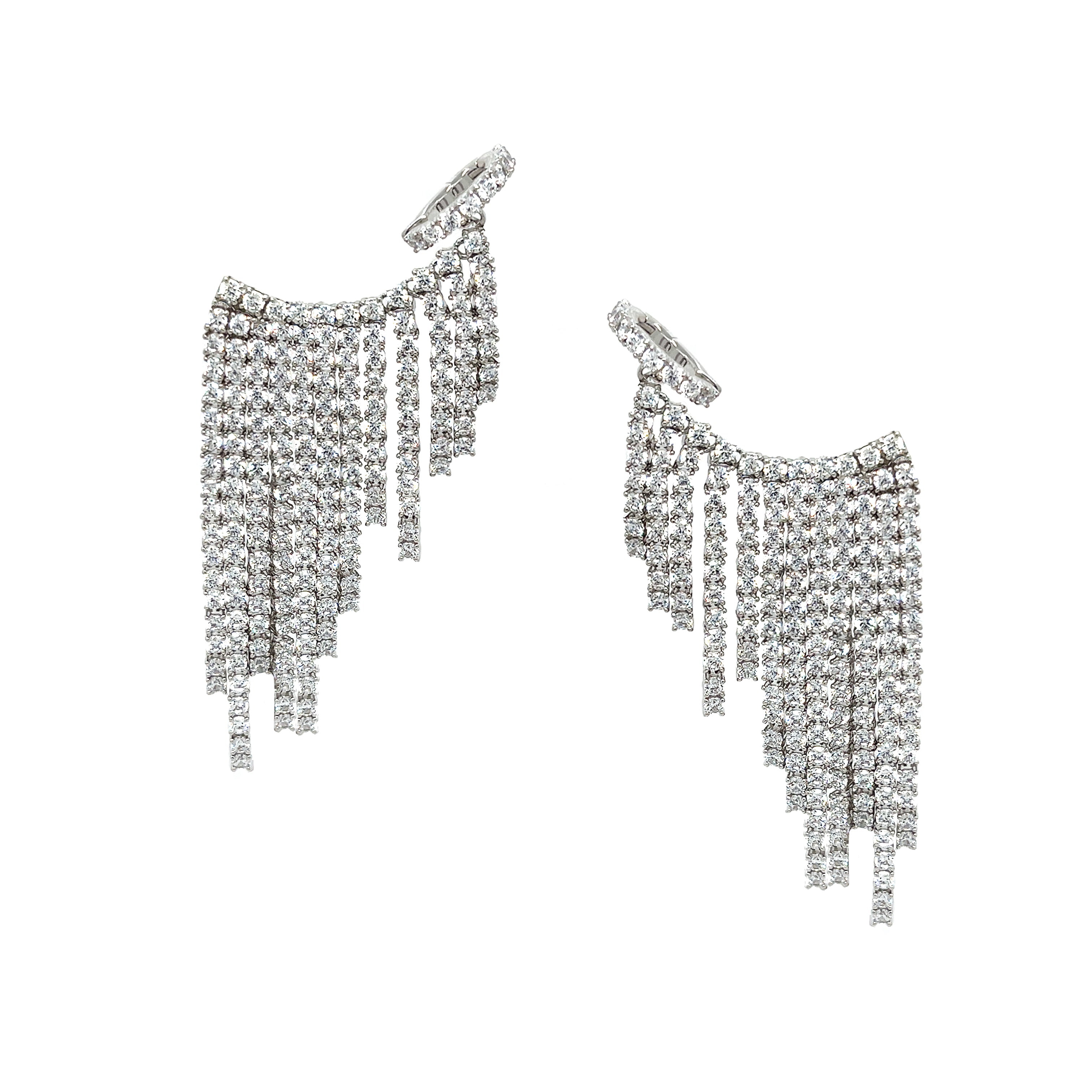 Silver fringe earrings on a white background