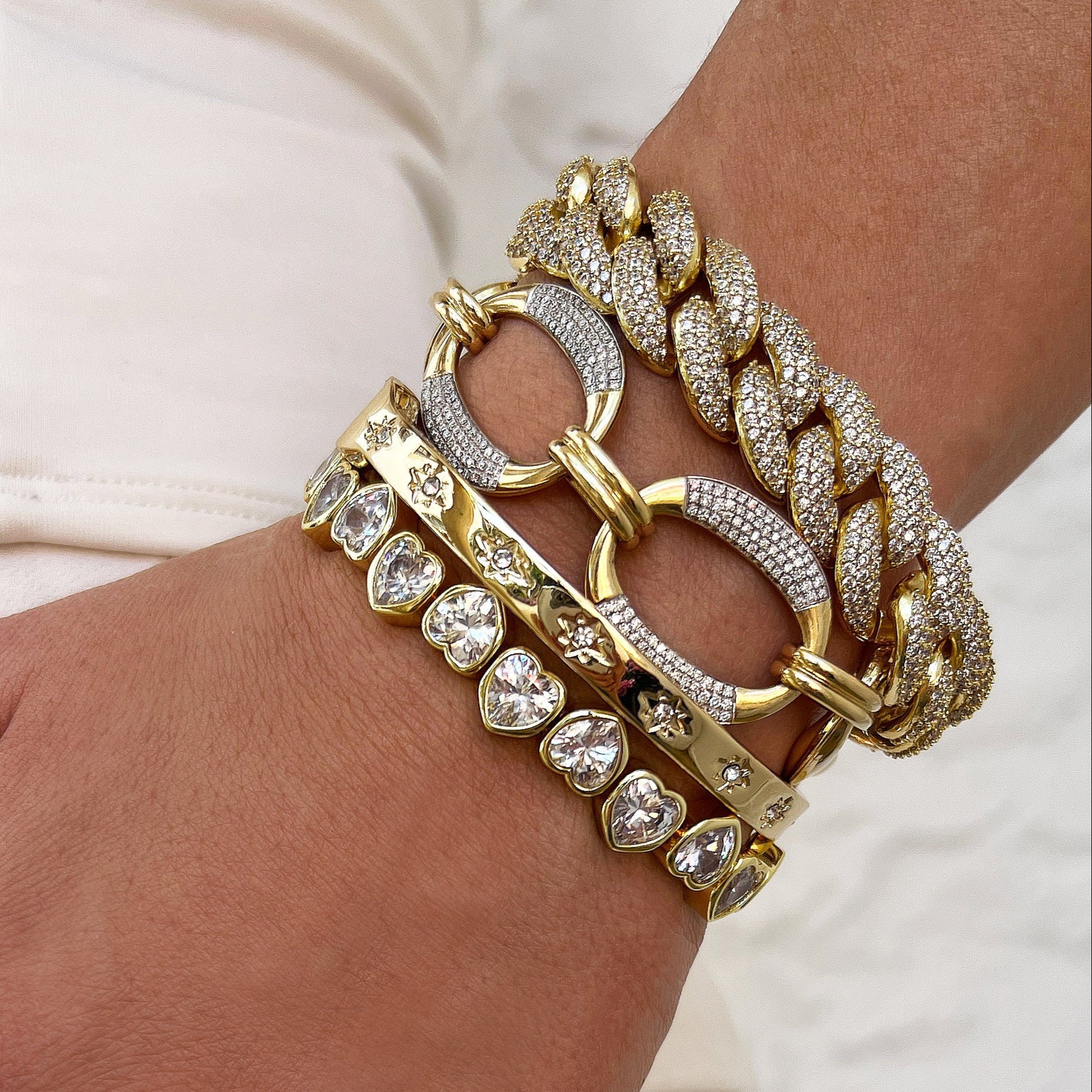CZ Heart Stretch Bracelet
Elevate your style with our Heart Stretch Bracelet. The crystal hearts add a touch of sophistication and charm to any look. With its easy stretch design, this bracelet is the perfect accessory for on-the-go style.
Yellow Gold Plated
Hearts: 0.38" Wide