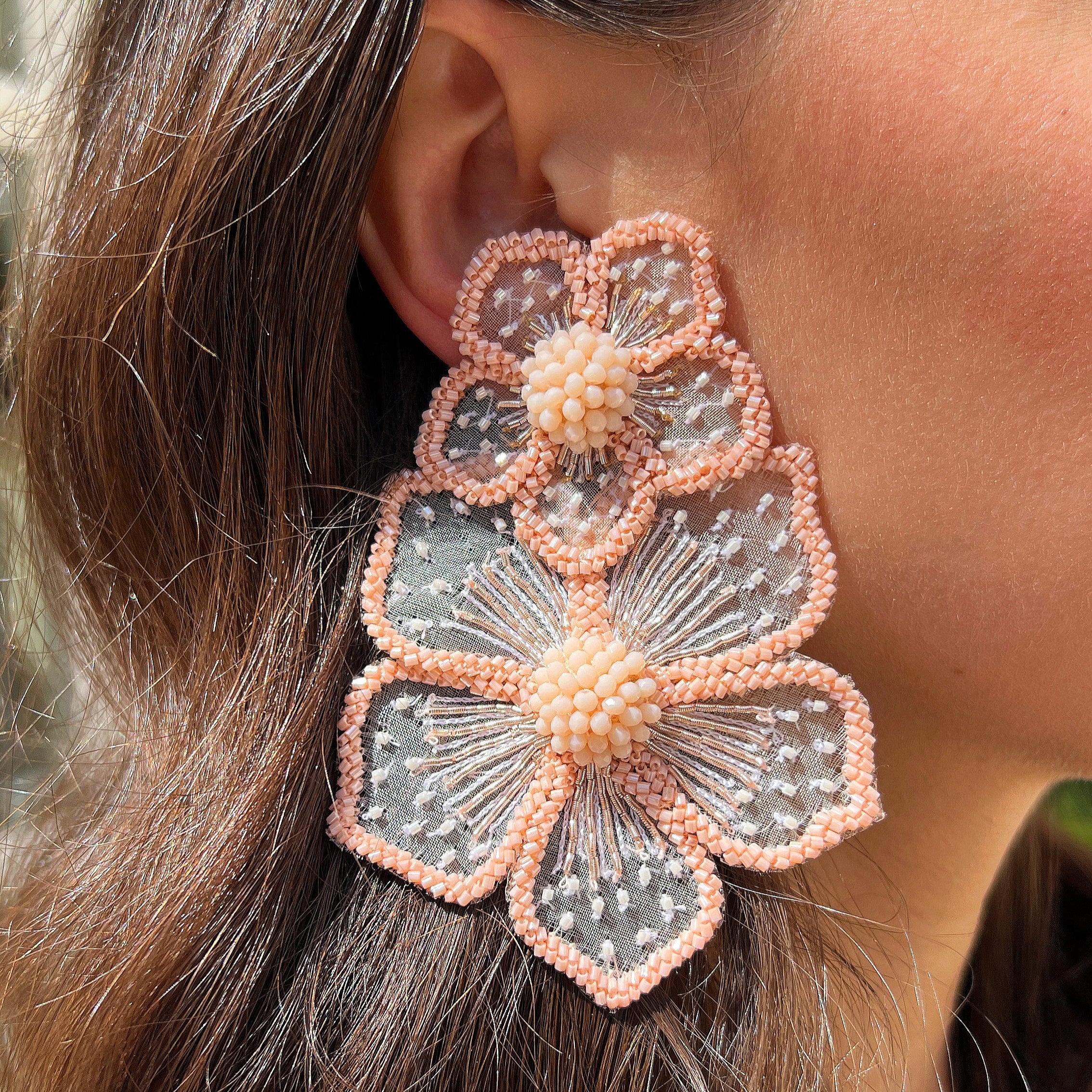 Blush Double Peony Flower Pierced Earrings
Elevate any outfit with these Blush Flower Earrings. Make a statement with their unique floral design and add a touch of whimsy to your look. Perfect for any occasion!
3.90" Long X 2.68" Wide