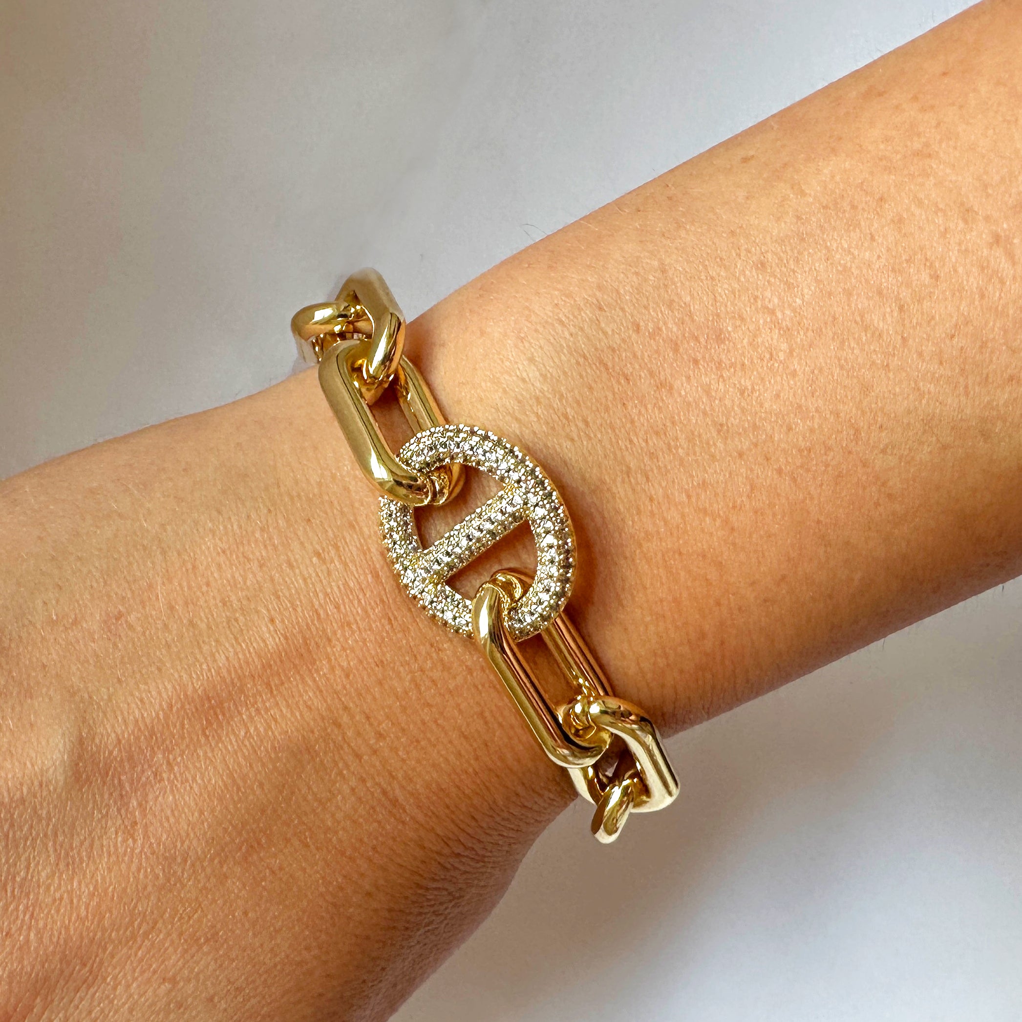 Pave CZ Mariner Chain Link Bracelet Yellow Gold Plated 7.5" Length Center Link: 0.68" Long X 0.83" Wide Magnetic Closure While supplies last. All Deals Of The Day sales are FINAL SALE.