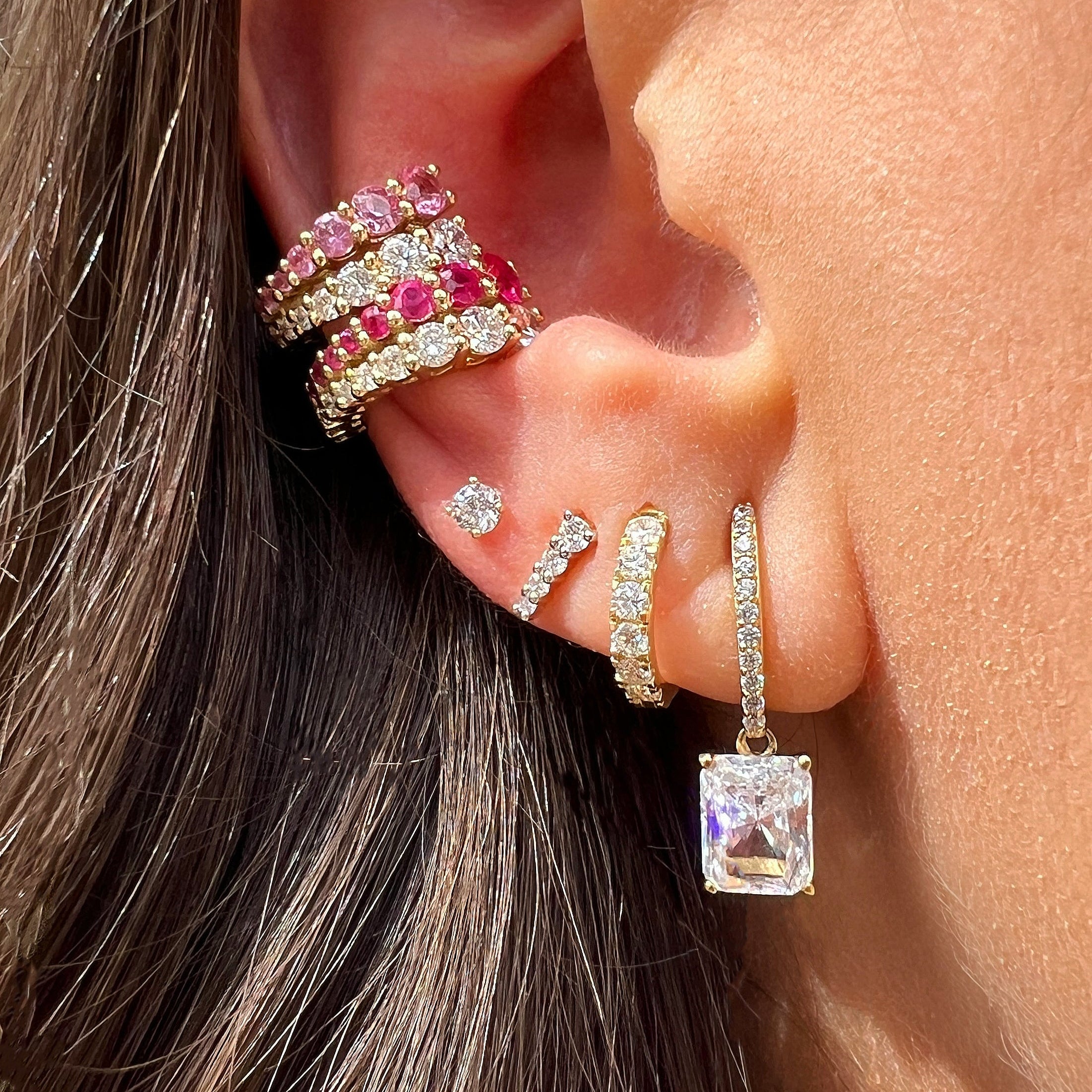 Diamond & Pink Sapphire Double Row Cuff Earring
Add a playful pop of color to your look with this Diamond & Pink Sapphire Cuff Earring. Featuring vibrant sapphires paired with sparkling diamonds, this cuff brings a unique sparkle that’s sure to catch every eye. Perfect for adding a fun, elegant twist to any outfit!
14K Yellow Gold
0.49 Diamond Carat Weight
0.58 Pink Sapphire Carat Weight
0.26" Wide