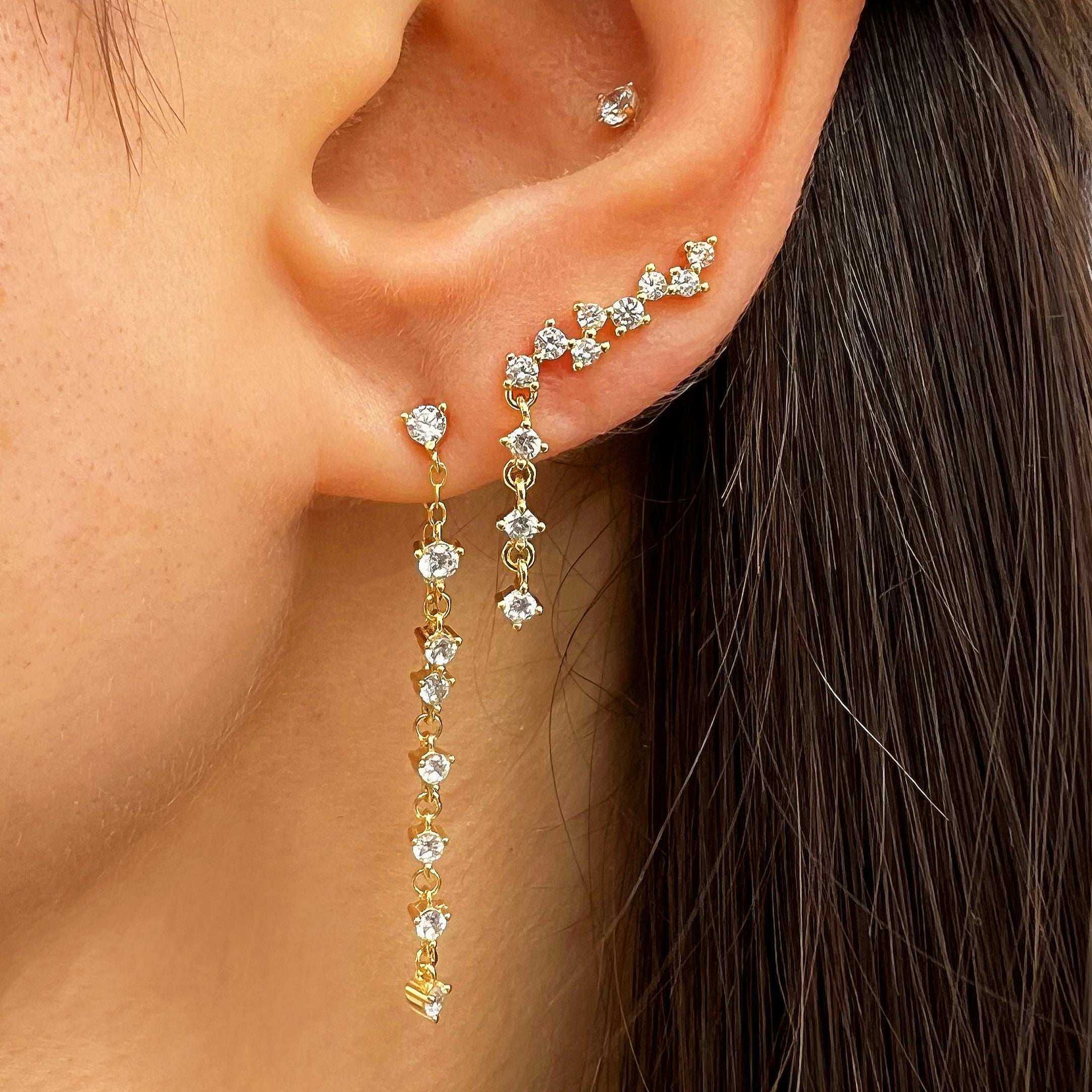 CZ Crawler Drop Pierced Earrings
White Gold Plated Over Silver
0.65" Long X 0.14" Wide
0.47" Long