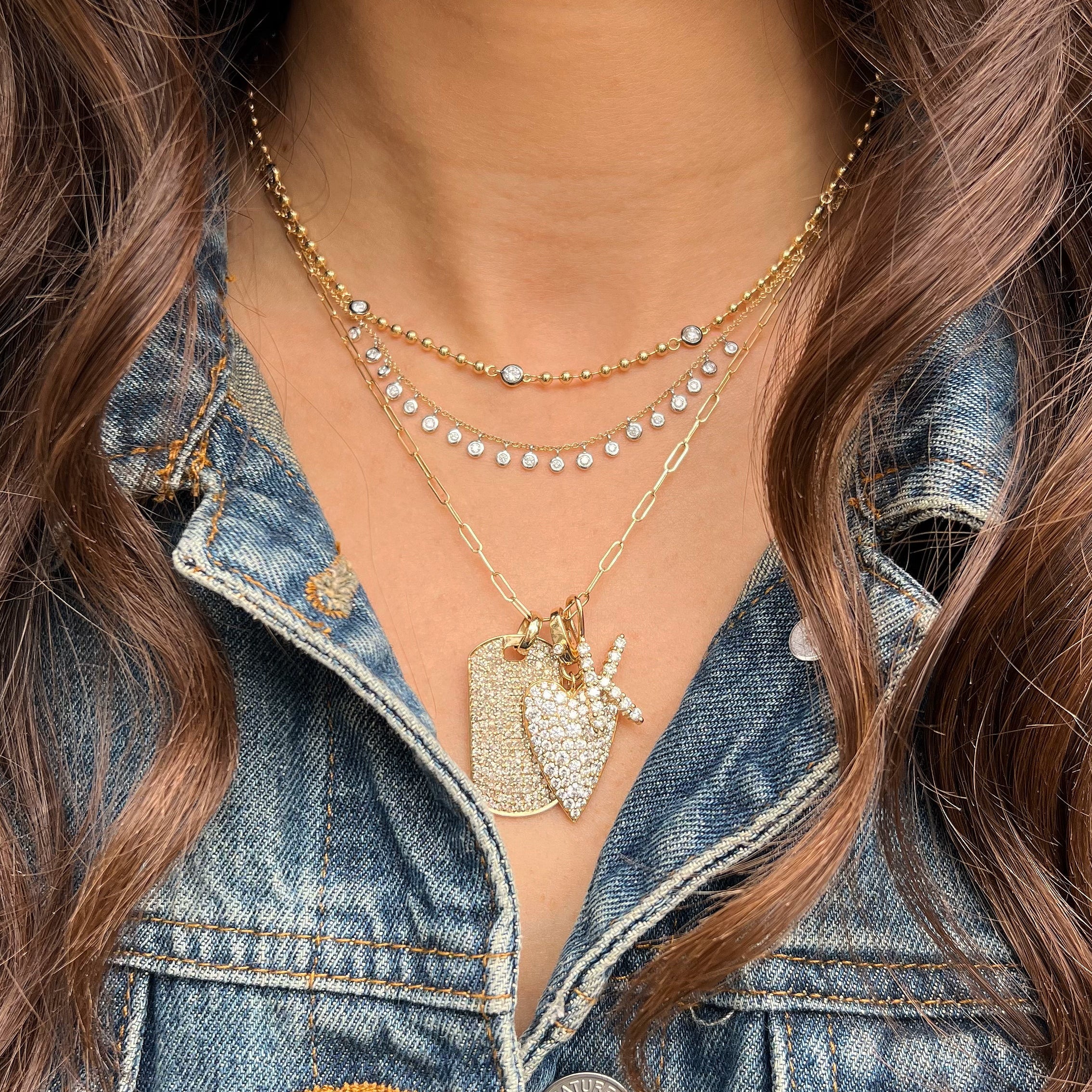 Diamond Heart Charm Pendant
Elevate your charm necklace with our Diamond Heart Charm. This stunning charm features sparkling diamonds on an elongated heart design, adding a touch of elegance to any look.
14K Yellow Gold
2.06 Diamond Carat Weight
1.46" Long X 0.66" Wide