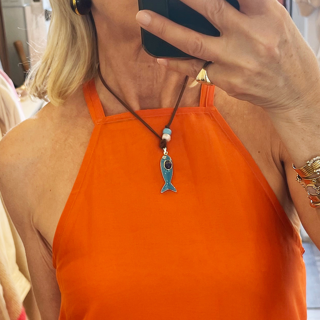 Resin Fish Pendant On Suede Leather Cord Necklace
This Fish Pendant Necklace is available in multiple color options, adding subtle yet eye-catching variety to your necklace collection. Perfect for layering, it complements diverse styles while being a chic statement.
Yellow Gold Filled
Fish Pendant: 1.5" Long X 0.5" Wide
Drop: 1.75" Long