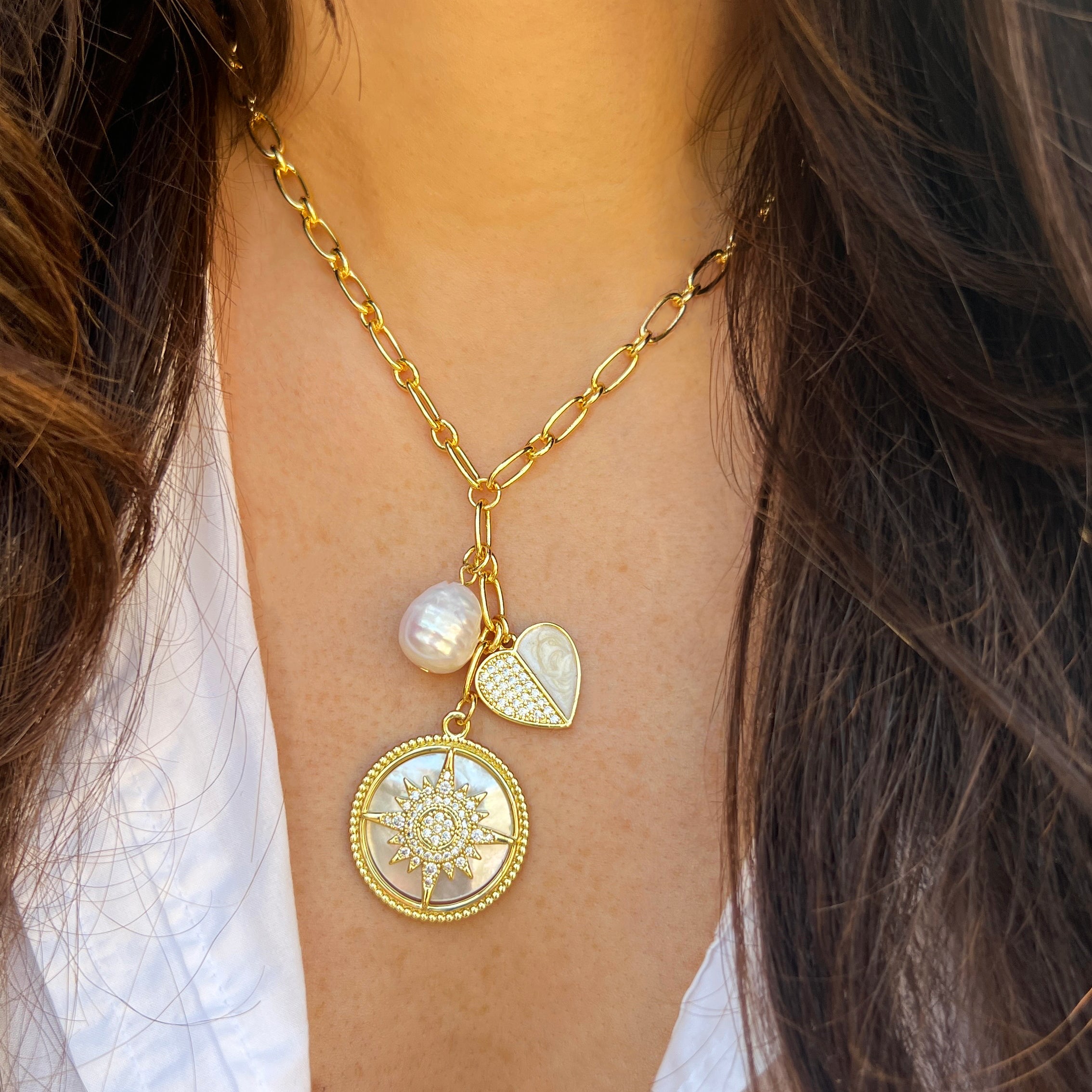 Pearl Cluster Charm Link Necklace
Yellow Gold Plated
Pearl: 0.51" Long X 0.43" Wide
Heart: 0.58" Wide
Disc: 0.97" Wide
18-21" Adjustable Length
While supplies last. All Deals Of The Day sales are FINAL SALE.