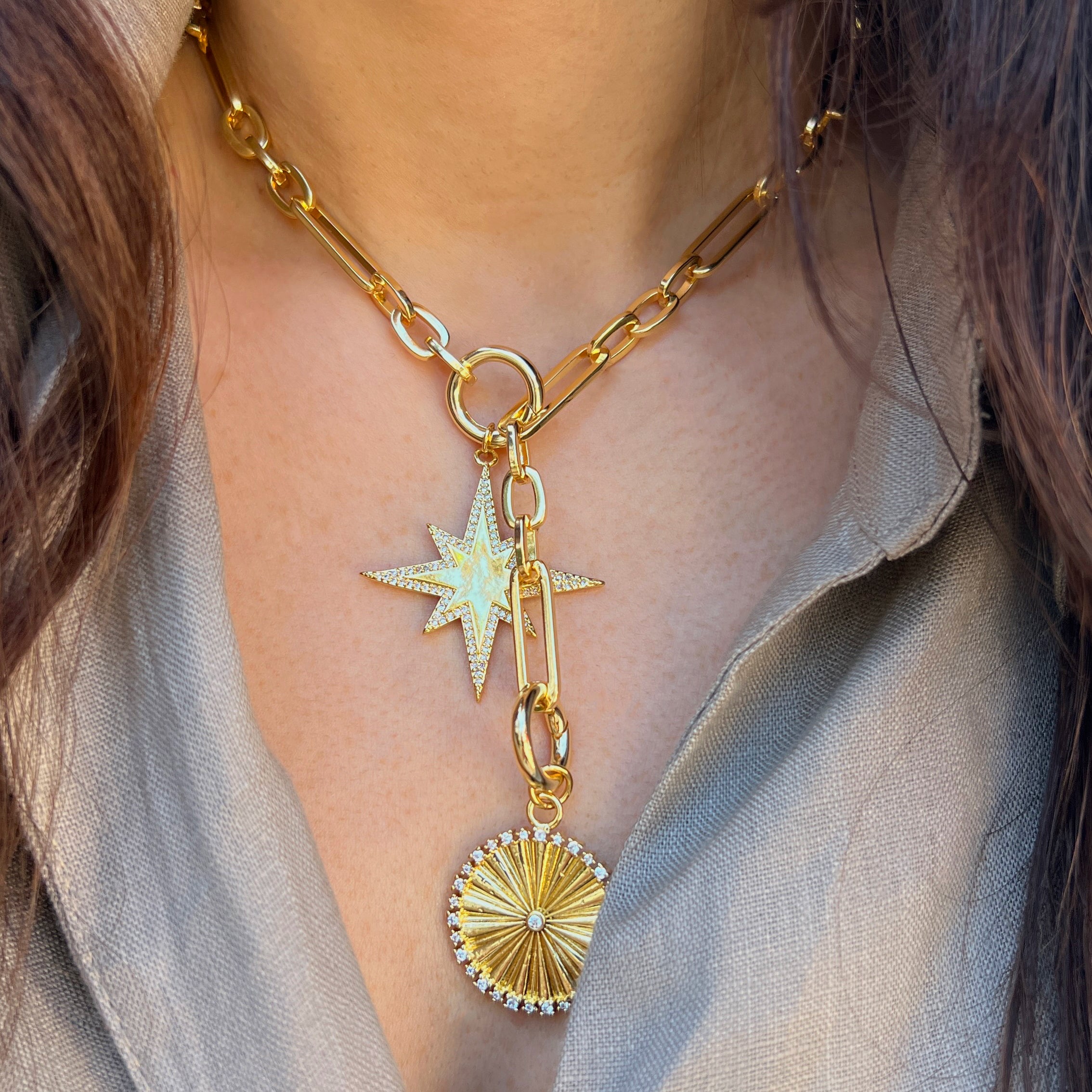 CZ Disc & Starburst Charm Lariat Necklace
Yellow Gold Plated
Starburst Charm: 1.37" Wide
Disc Charm: 0.95" Wide
Lariat Drop: 4.50" Long
18-20" Adjustable Length
While supplies last. All Deals Of The Day sales are FINAL SALE.
