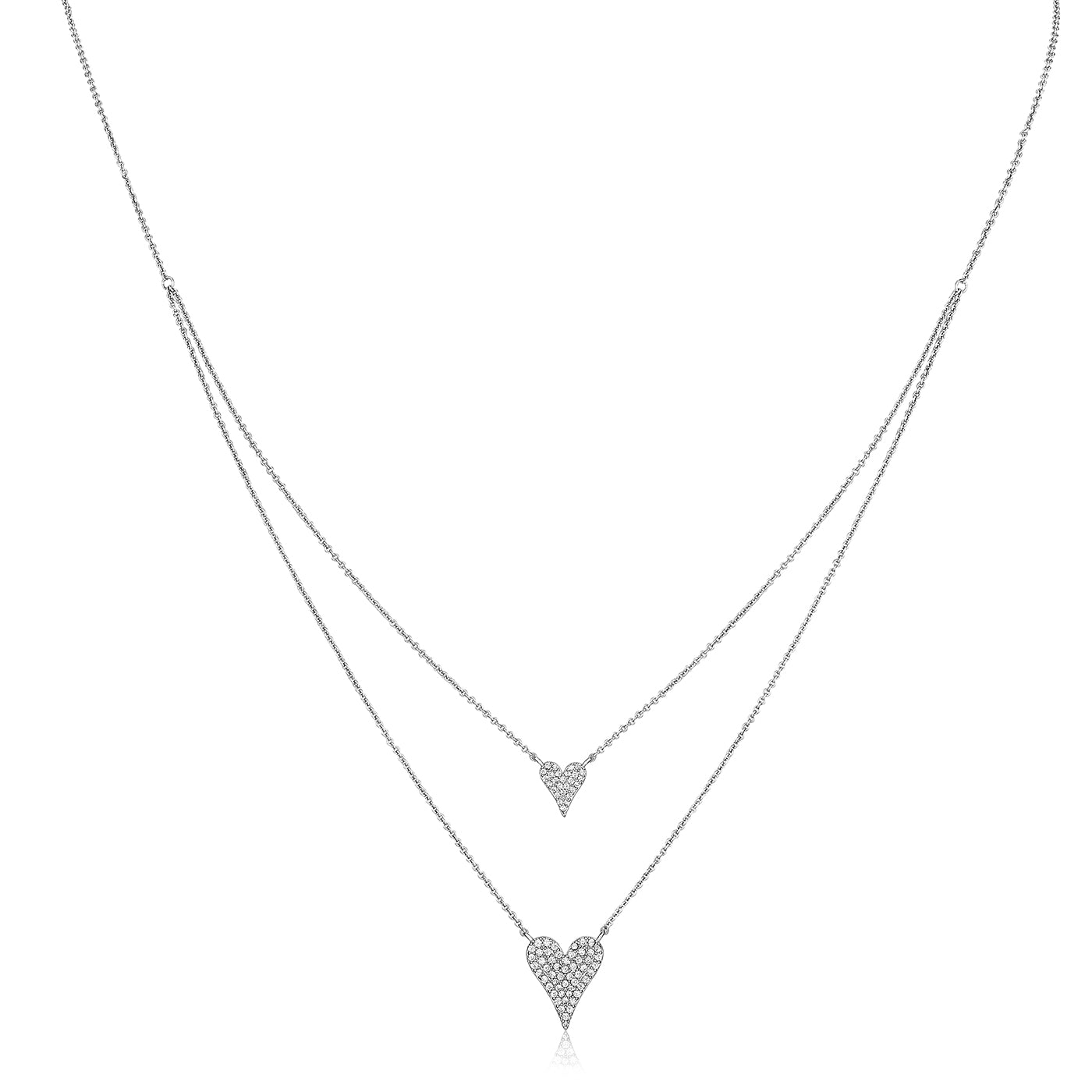 Two heart-shaped pendants on a silver chain against a white background
Layered Double Heart Necklace
White Gold Plated
Small Heart: 0.38" Long X 0.38" Wide
Large Heart: 0.50" Long X 0.63" Wide
16-20" Long
Faux Pave Diamond