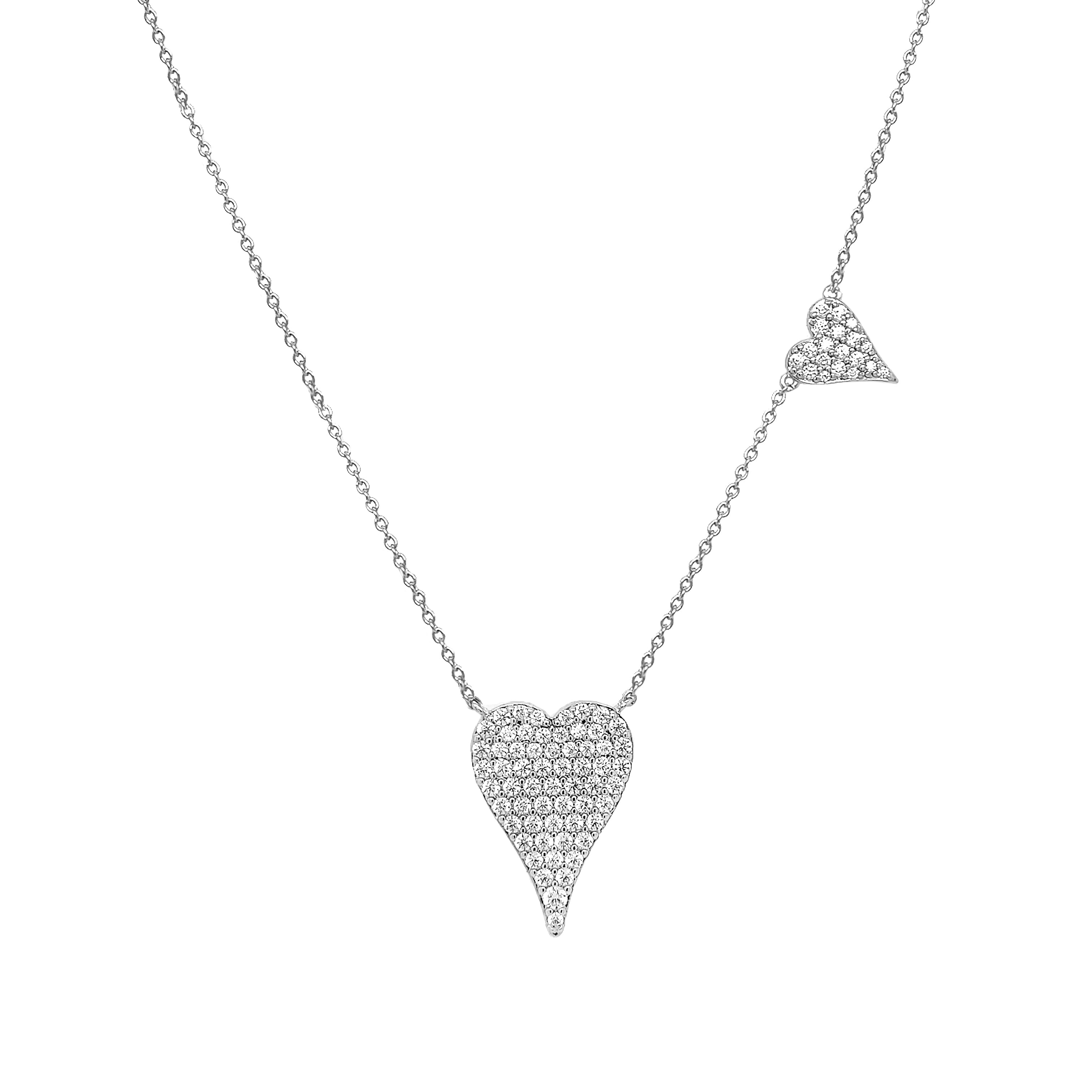 Pave CZ Double Heart Necklace
Add some sparkle to your style with this Double Heart Necklace. Featuring delicate pave crystals and a charming double heart design, this necklace is perfect for any occasion. Wear it alone or layer it with other pieces for a unique look!
White Gold Plated
Large Heart: 0.75" Long X 0.55" Wide
Small Heart: 0.36" Long X 0.31" Wide
16-20" Adjustable Length