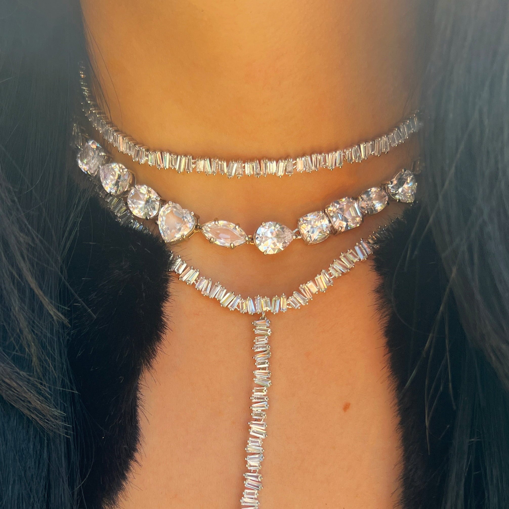 Multi-Shape CZ Necklace
A refined statement necklace designed for effortless sparkle. Vermeil plated in white gold, this piece features an assortment of mixed-shape stones for a modern, dimensional look. Set with shimmering cubic zirconia stones, the combination of cuts adds visual interest while remaining versatile enough for both everyday wear and special occasions. Secured with a classic clasp for comfortable, confident styling.
White Gold Plated Over Silver
16-18" Adjustable Length
Stones may vary in