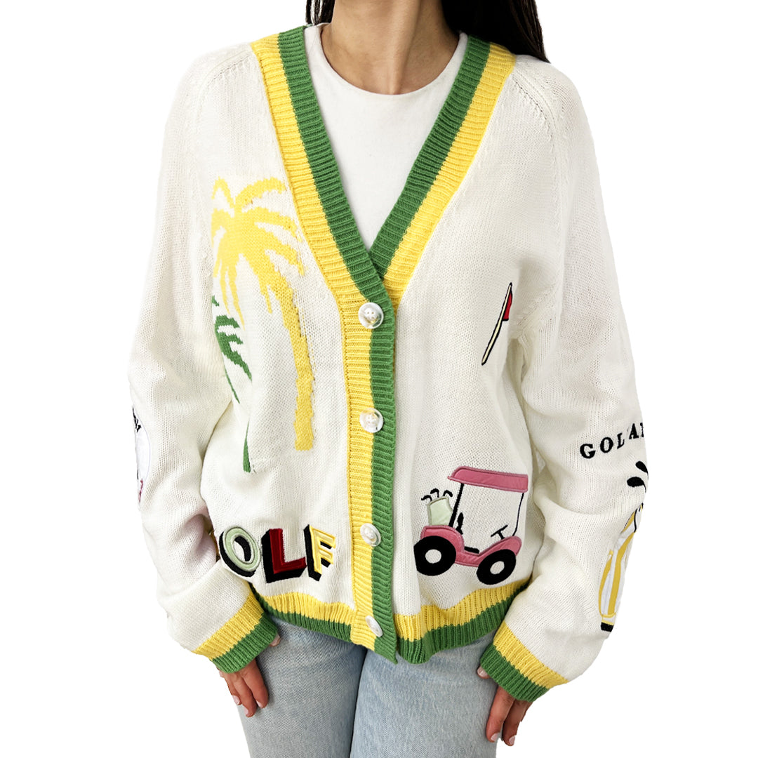 Cream Golf Cardigan Sweater
This classic golf cardigan is the perfect touch of layer. A relaxed-fit cardigan in cream, with embroidered golf patches and contrast trim, is great for laid-back days or a touch of preppy flair. It pairs effortlessly with jeans or layers over a dress, making it an easy, versatile choice for any casual outing or a day at the golf course. 
Relaxed Fit
Runs true-to-size
Hand Wash Cold Separately
100% Acrylic