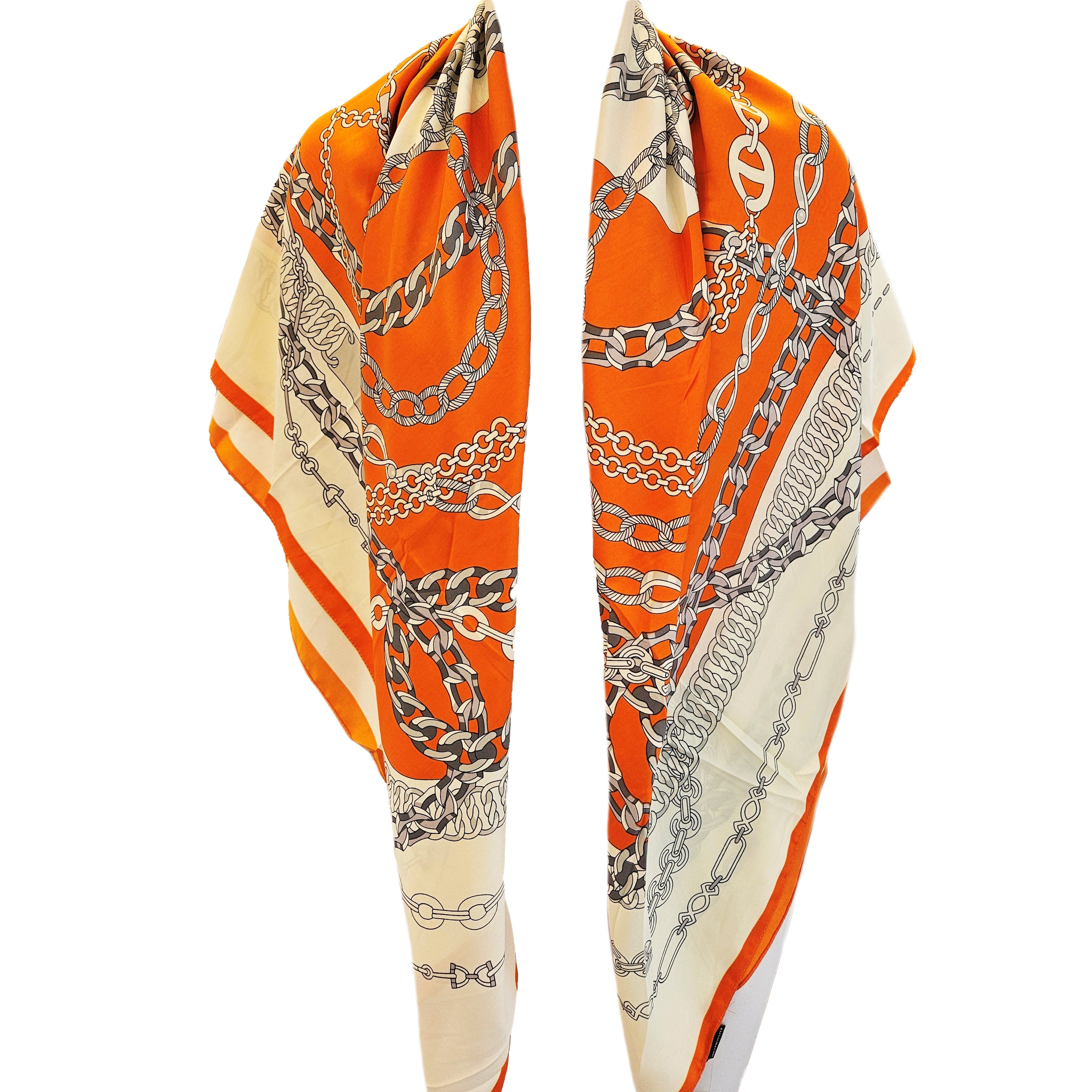 Orange & White Print Scarf
This patterned scarf offers versatile styling—wear it as a shirt, dress, or scarf to create unique, bold looks with ease.
51" x 51" Wide
100% Polyester