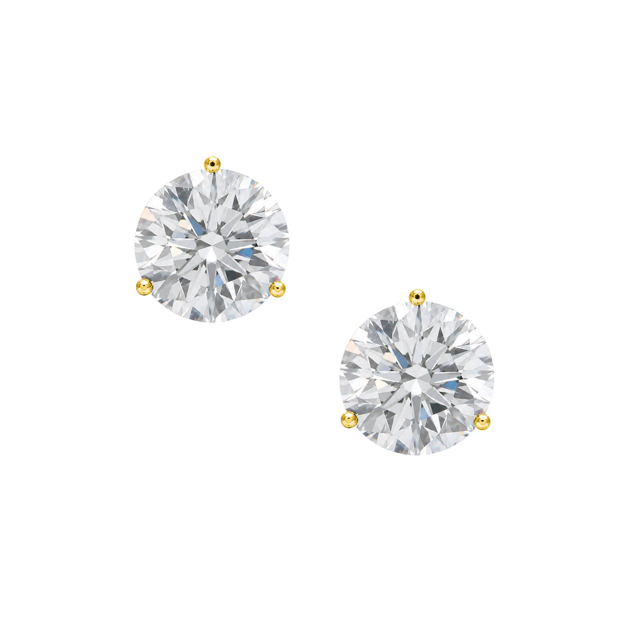 A pair of round-cut lab grown diamond stud earrings set in yellow gold prong settings on a solid white background.