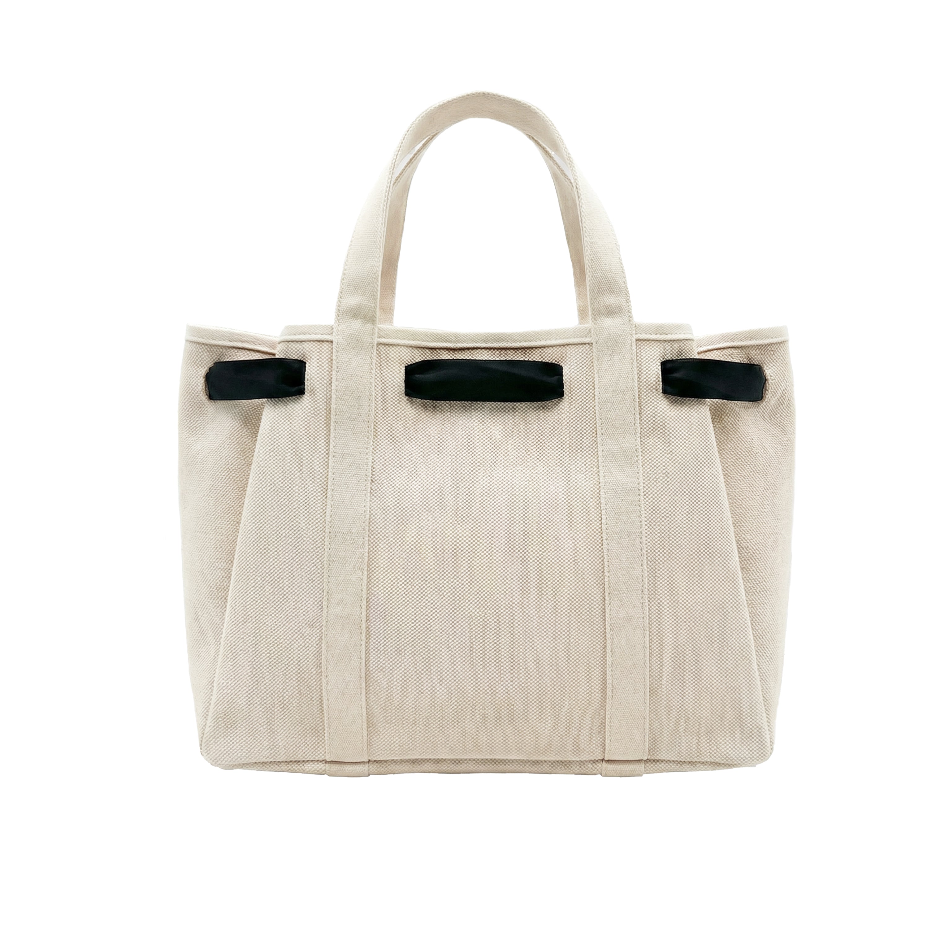 Black Ribbon Scarf Canvas Tote
A structured canvas tote designed to carry you through your day with effortless style. Features a removable black ribbon scarf (includes a pink scarf for versatile styling) that lets you switch up your look, tie it in a knot, bow, or remove it completely.
Interchangeable Ribbon Scarf (includes pink scarf)
14" Wide x 7.5" Deep x 10.5" High
Features Bottom Studs to keep bag protected from surfaces