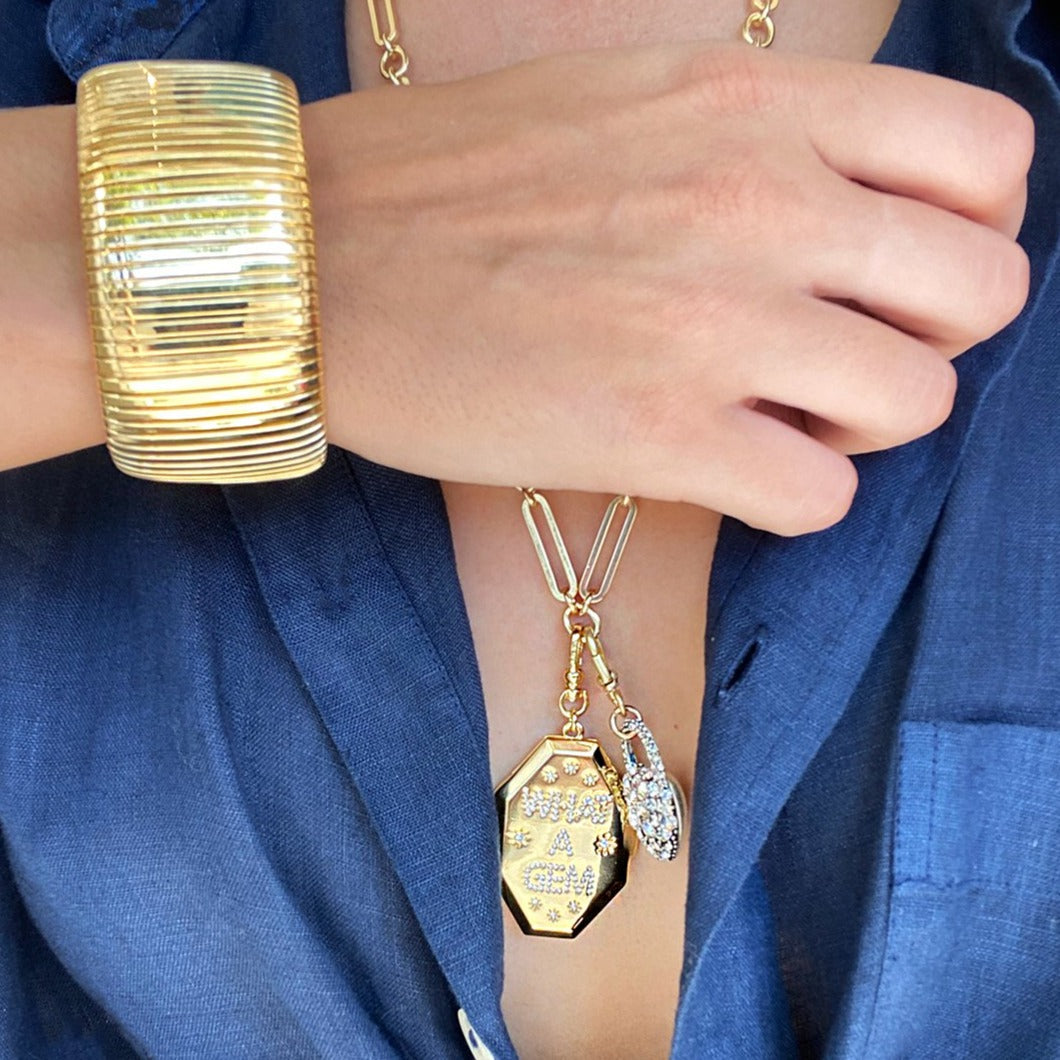 Wide Flat Cuff Bracelet Yellow Gold Plated Over Silver Oval Shape: 2.22” X 1.76” 1.30” Width 0.50-0.75” Flexible Opening As worn by Bevy Smith