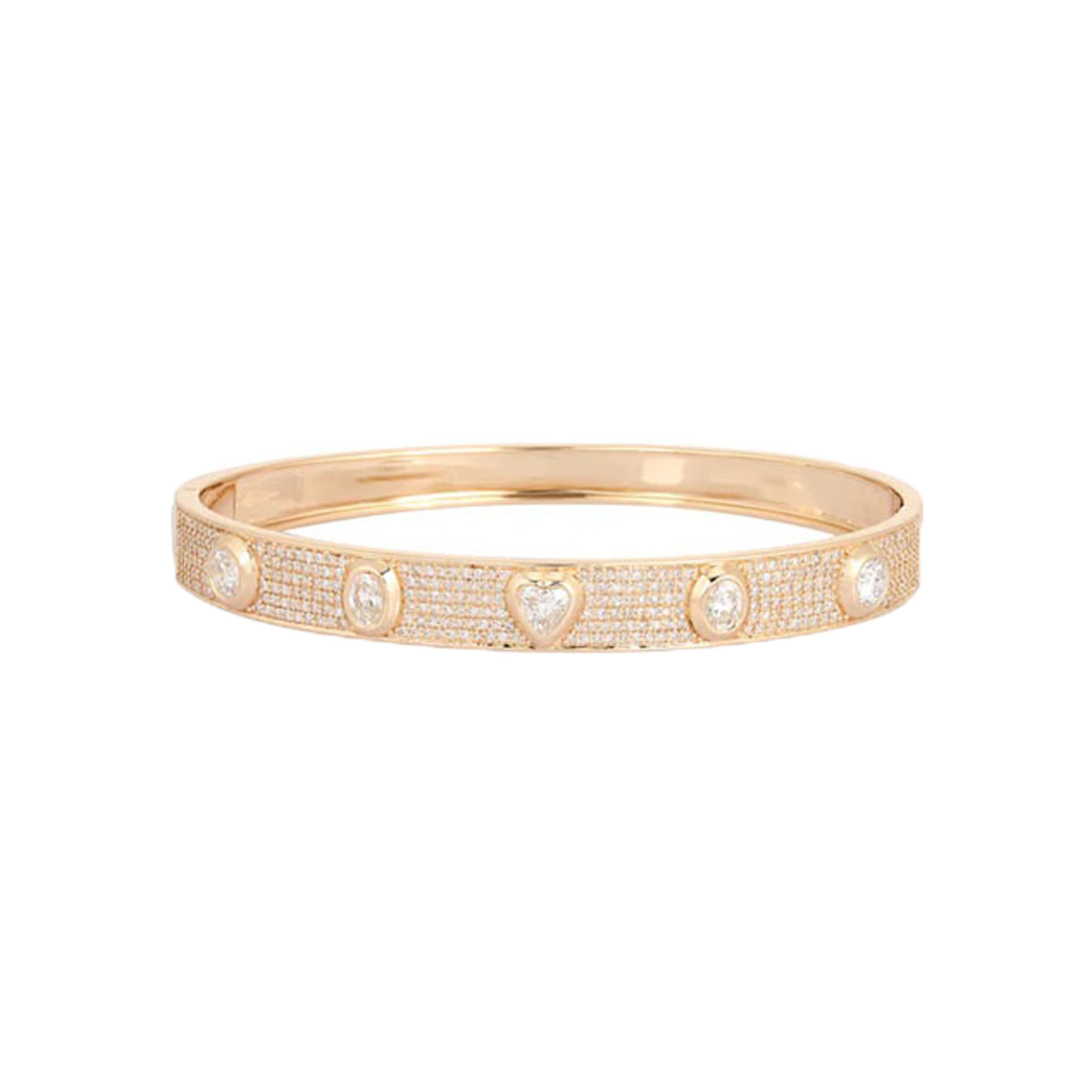 Pave Diamond Heart Bezel Bracelet 14K Yellow Gold 1.01 Diamond Carat Weight 2.25" Inner Diameter 0.25" Thick 2.27" Long X 1.81" Wide Hinge Closure