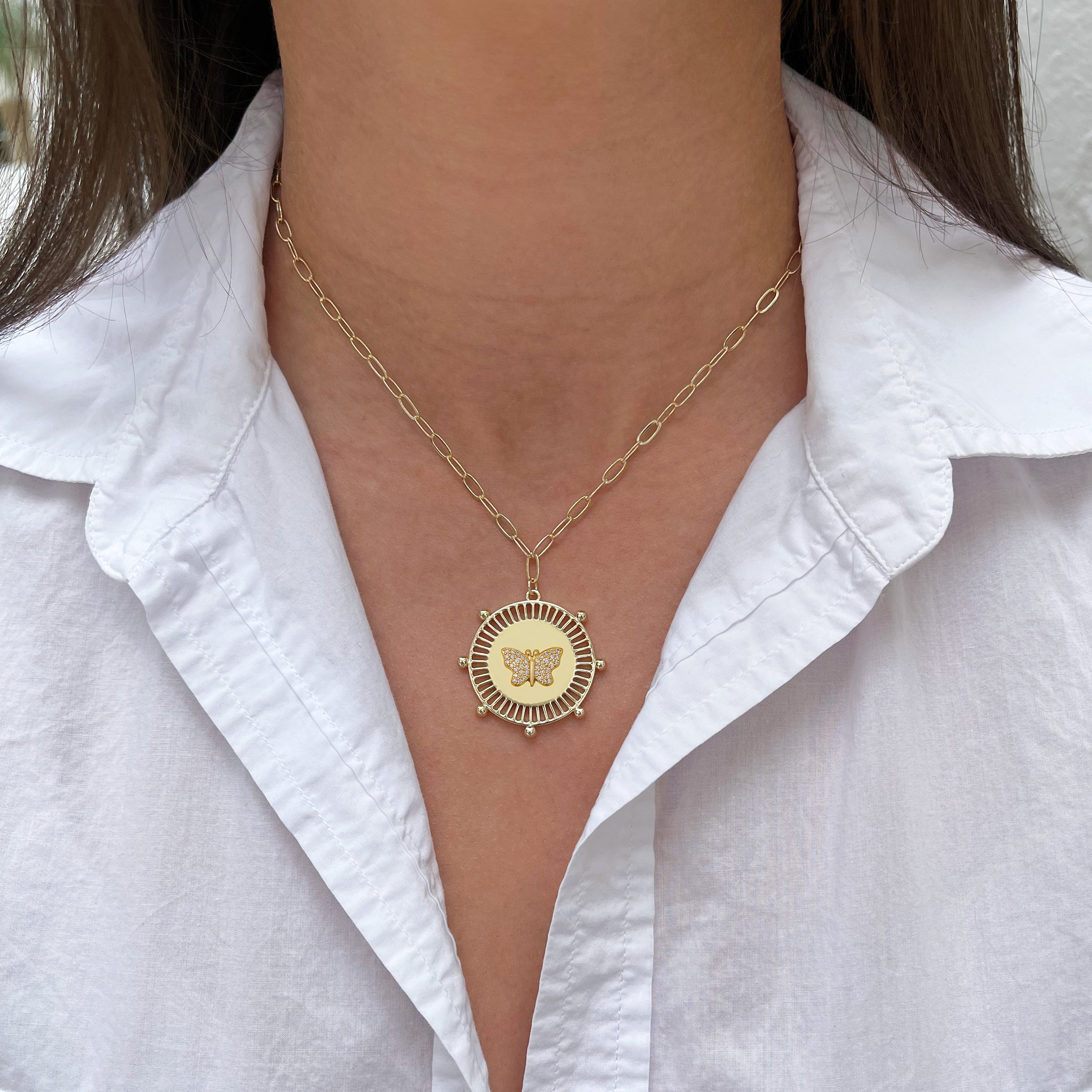 Yellow Gold Plated Pave Butterfly Medallion Necklace on Paperclip Chain Yellow Gold Plated Chain: 16-20" Length Medallion: 1.0" Diameter Butterfly: 0.5" Diameter