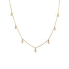 14K Gold Diamond Bezel Drops Chain Necklace  14K Yellow Gold 0.14 Diamond Carat Weight Chain: 16-18" Length Bezel: 0.10" Diameter