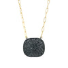 Pave Black CZ Plate Pendant Statement Link Chain Necklace  The black CZ stones on the pendant are set in a pave style, creating a unique look that exudes confidence and style. The pendant hangs gracefully from the link chain, adding a touch of sophistication to your look. Make a bold statement with this edgy and chic pendant necklace!  Yellow Gold Plated 1.32" Long X 1.52" Wide 16.5" Long
