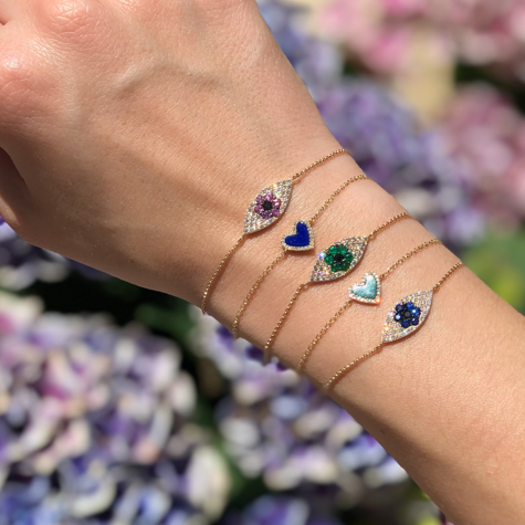 Blue Sapphire & Diamond Eye Bracelet 14K Yellow Gold 0.24 Emerald Carat Weight 0.77 Black & White Diamond Carat Weight Eye: 0.25" Long X 0.66" Wide 6-7" Adjustable Length