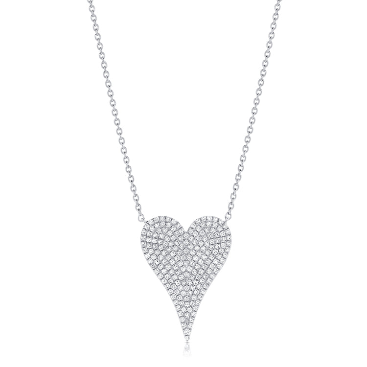 Large Diamond Heart Chain Necklace
Sparkle up your style with our Large Diamond Heart Necklace! This staple piece features shimmering diamonds on a classic heart pendant, perfect for adding a touch of elegance to any outfit. A must-have for any jewelry collection!
14K white gold
0.49 Diamond Carat Weight
0.80" Long X 0.58" Wide
15.5-17.5" Adjustable Length