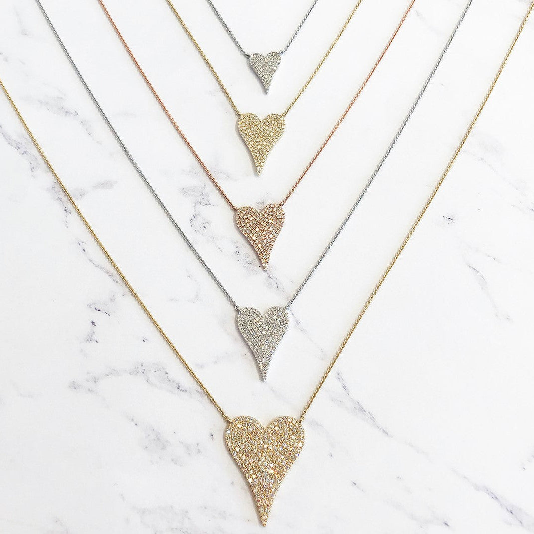 Pave diamond heart necklaces in yellow, rose, and white gold and small, medium, and large sizes