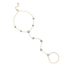 Blue Opal Adjustable Hand Chain

The ultimate "cool girl" accessory. Featuring high-quality simulated opals and a fine 18K gold-plated chain, it’s designed to drape elegantly over the hand for a look that is both edgy and sophisticated. Thanks to the adjustable slide clasp, you can find your perfect fit for all-day comfort. Wear it solo to let the opals pop, or pair it with your favorite gold rings for a maximalist moment.

18K Yellow Gold Plated
Simulated Blue Opal
Stone Size: 5MM &amp; 6MM
Adjustable Slid
