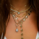 Pear Shape Charm With Black Rhodium

Elegant and endlessly versatile, this pear-shaped faux diamond charm adds refined sparkle to your favorite chain. The contrast of black rhodium and 14K yellow gold gives this classic design a fresh, contemporary edge.

14K Yellow Gold &amp; Oxidized Gold
2.0 Faux Diamond Carat Weight