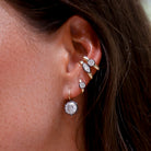 14K Georgian Diamond Hoop Earrings

A timeless pair of Georgian-inspired hoop earrings featuring brilliant diamonds set in striking black rhodium. Crafted in 14K yellow and oxidized gold, these elegant hoops offer vintage charm with a modern edge, perfect for effortless everyday wear or elevating an evening look.

14K Yellow &amp; Oxidized Gold

0.48" Diamond Carat Weight&nbsp;

0.5" Wide
Georgian Style