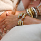 Pave Square Tips Hinge Bangle Bracelet

This yellow gold-plated hinge bangle is accented with crystal-pave square tips and sparkling details, the perfect statement on its own or layered with your favorite bracelets.

Yellow Gold Plated
0.35" Wide