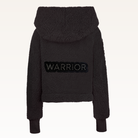The Warrior Cropped Lounger is more than loungewear—it’s a lifestyle. I designed it in plush sherpa to be worn 24/7, 365 days a year, from couchside to courtside and everywhere in between. For me, it’s a true badge of comfort and strength—there for every moment I choose to thrive.&nbsp; Show here in Black.


Product Details &amp; Care Instructions:

Fabrication: 100% Polyester, Sherpa
Features: Sherpa, Hood, Button Front-Closure, Rib Cuffs with Thumbholes
Fit: Relaxed Fit: Generously Cut with Maximum Wearin