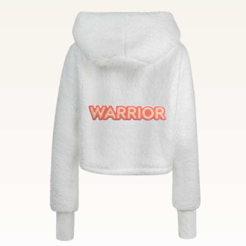 The Warrior Cropped Lounger is more than loungewear—it’s a lifestyle. I designed it in plush sherpa to be worn 24/7, 365 days a year, from couchside to courtside and everywhere in between. For me, it’s a true badge of comfort and strength—there for every moment I choose to thrive.&nbsp;Show here in White.


Product Details &amp; Care Instructions:

Fabrication: 100% Polyester, Sherpa
Features: Sherpa, Hood, Button Front-Closure, Rib Cuffs with Thumbholes
Fit: Relaxed Fit: Generously Cut with Maximum Wearing