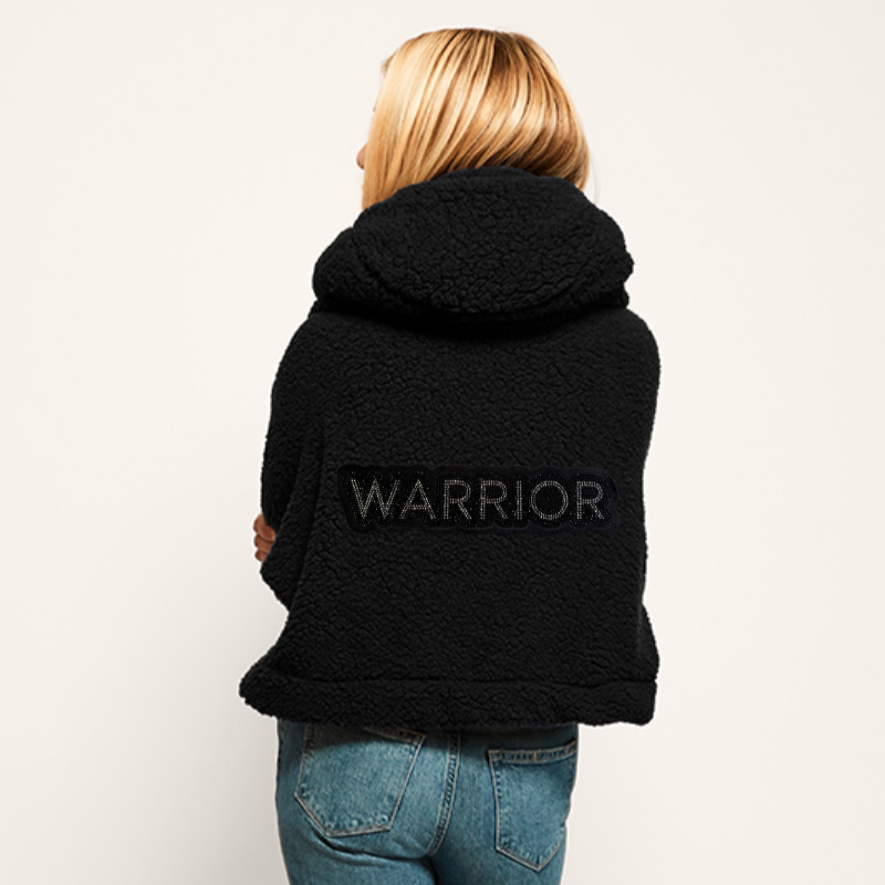 The Warrior Cropped Lounger is more than loungewear—it’s a lifestyle. I designed it in plush sherpa to be worn 24/7, 365 days a year, from couchside to courtside and everywhere in between. For me, it’s a true badge of comfort and strength—there for every moment I choose to thrive.&nbsp; Show here in Black.


Product Details &amp; Care Instructions:

Fabrication: 100% Polyester, Sherpa
Features: Sherpa, Hood, Button Front-Closure, Rib Cuffs with Thumbholes
Fit: Relaxed Fit: Generously Cut with Maximum Wearin