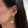 Single Pink Pearl Hope Hoop Pierced Earrings

Available in Yellow or White Gold Plated
1.50" Diameter