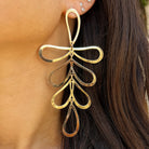 Open Leaf Pierced Earrings

Add a touch of playful to your look with our Open Leaf Earrings! These unique and delicate earrings feature a charming leaf design, perfect for any outfit. Embrace your playful side with a chic twist on a classic statement earring.

Yellow Gold Plated
4.26" Long X 2.20" Wide