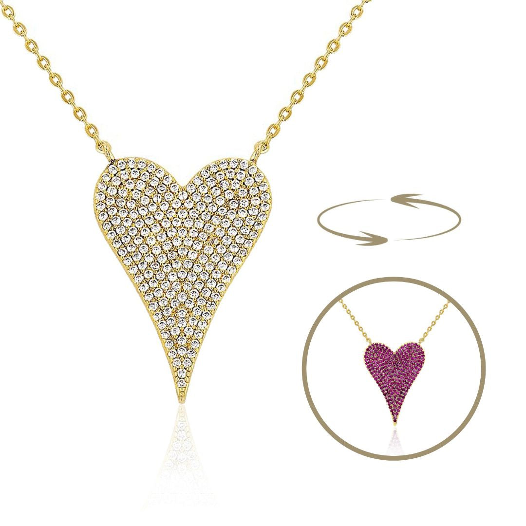 Pink &amp; White Reversible Heart Necklace

This reversible heart necklace seamlessly transitions between pink and clear pavé stones, offering understated elegance for everyday wear. Each side reveals a distinct aesthetic—choose soft pink femininity or minimalist clear stones, depending on your occasion and personal style. A sophisticated choice for those who appreciate versatility without compromise.

Yellow Gold Plated
Pave Cubic Zirconia
Heart approximately 1" High X 0.75" Wide&nbsp;
16.5-20.5" Adjustabl